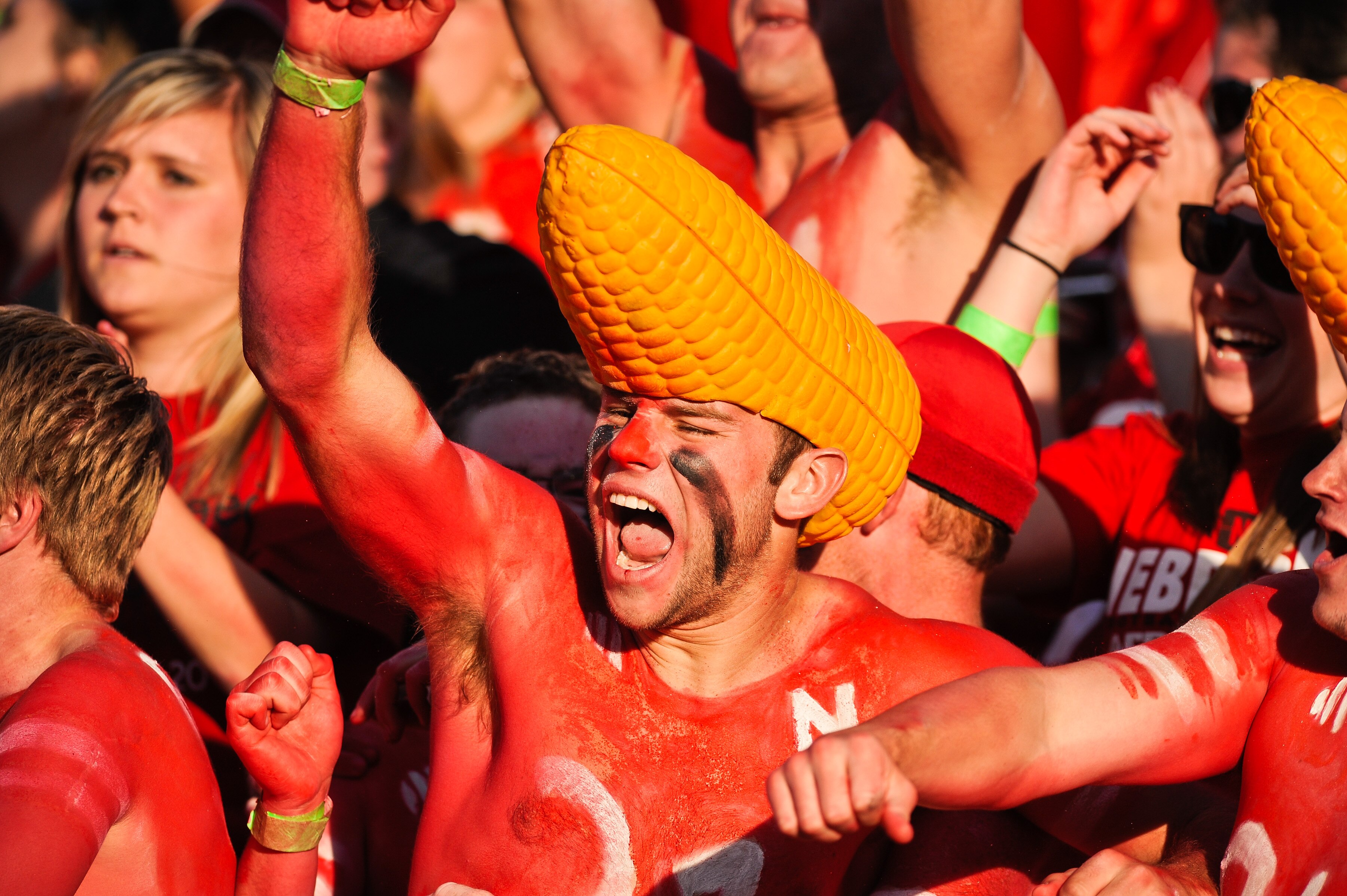 LINCOLN, NE - OCTOBER 16: Fans of the Nebraska Cornhuskers react after fourth a quarter punt return for a touchdown of their game against the Texas Longhorns at Memorial Stadium on October 16, 2010 in Lincoln, Nebraska. Texas Defeated Nebraska 20-13. (Pho
