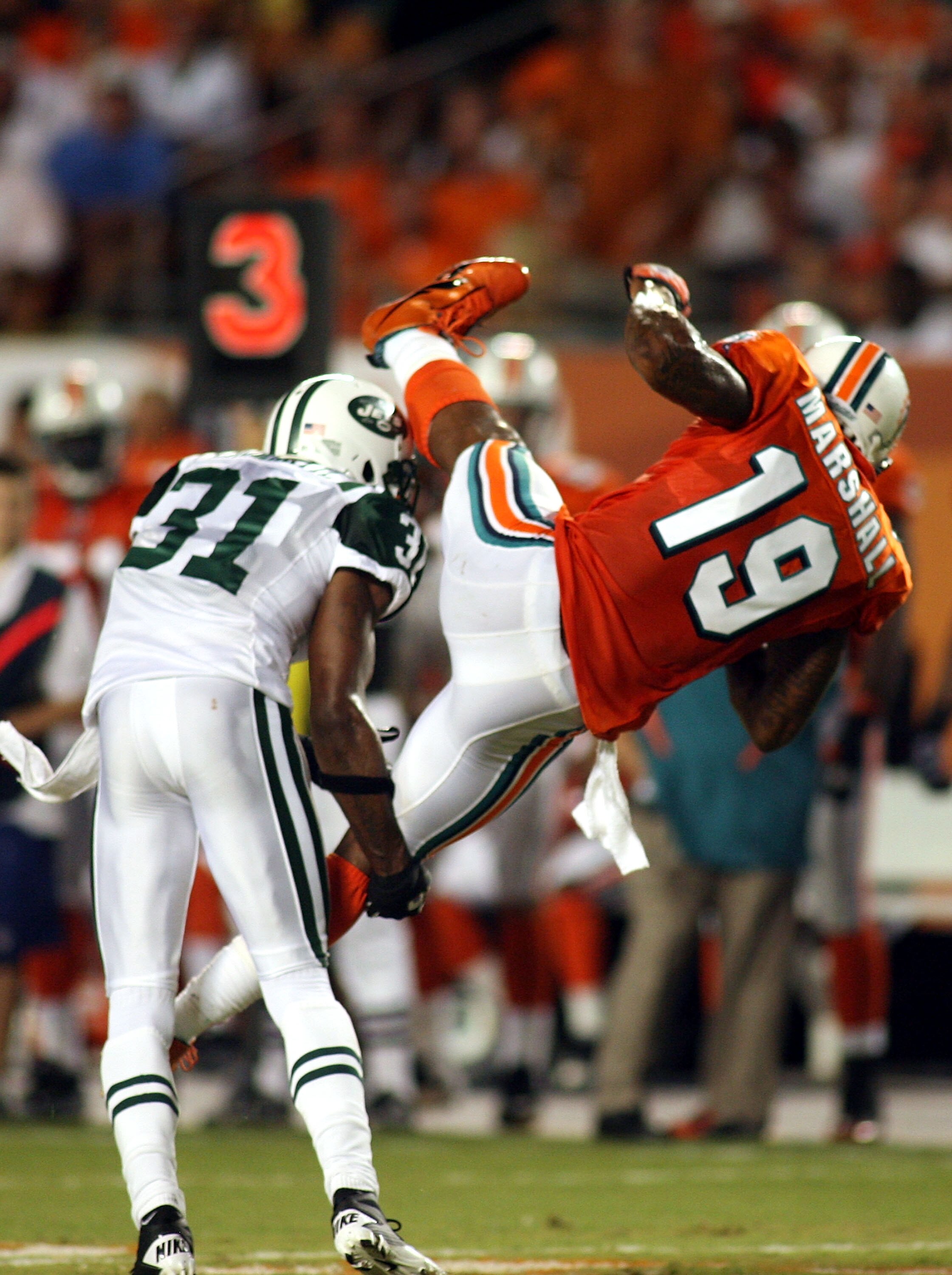 MIAMI - SEPTEMBER 26: Receiver Brandon Marshall #19 of the Miami Dolphins makes a catch against the New York Jets at Sun Life Stadium on September 26, 2010 in Miami, Florida. (Photo by Marc Serota/Getty Images)