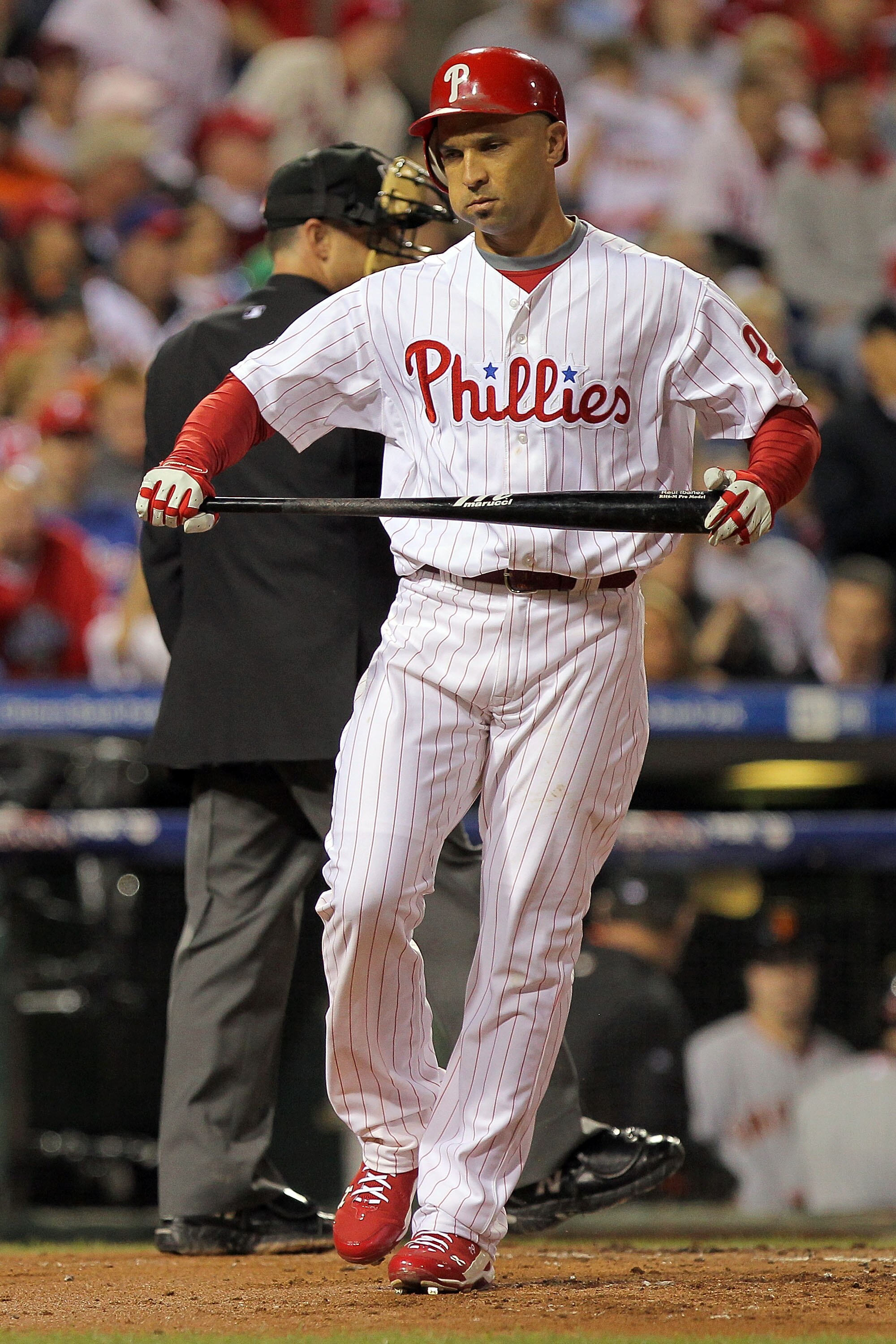 PHILADELPHIA - OCTOBER 17:  Raul Ibanez #29 of the Philadelphia Phillies reacts after striking out in the first inning with the bases loaded against the San Francisco Giants in Game Two of the NLCS during the 2010 MLB Playoffs at Citizens Bank Park on Oct