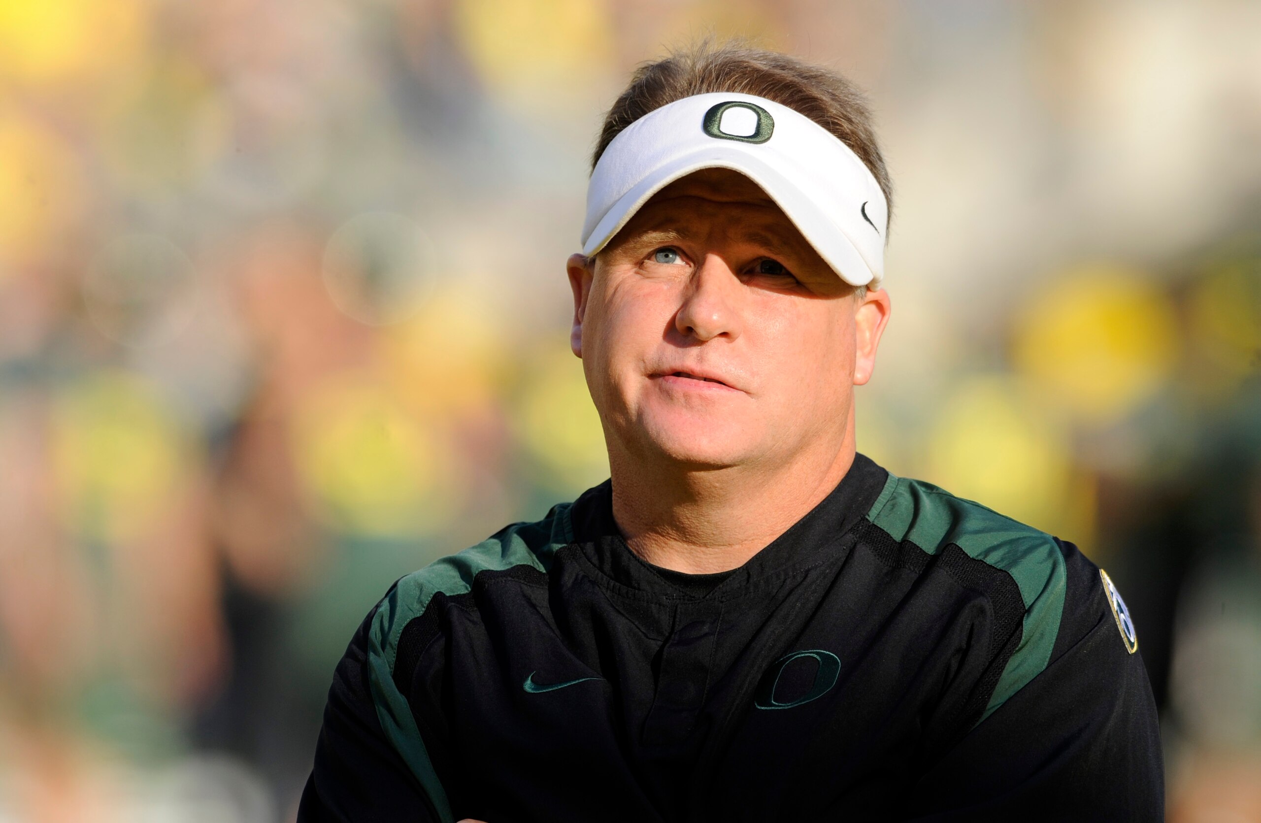 EUGENE, OR - OCTOBER 2: Head coach Chip Kelly of the Oregon Ducks looks up at the crowd in the stands before the game against the Stanford Cardinal at Autzen Stadium on October 2, 2010 in Eugene, Oregon. Oregon won the game 52-31. (Photo by Steve Dykes/Ge EUGENE, OR - OCTOBER 2: Head coach Chip Kelly of the Oregon Ducks looks up at the crowd in the stands before the game against the Stanford Cardinal at Autzen Stadium on October 2, 2010 in Eugene, Oregon. Oregon won the game 52-31. (Photo by Steve Dykes/Ge