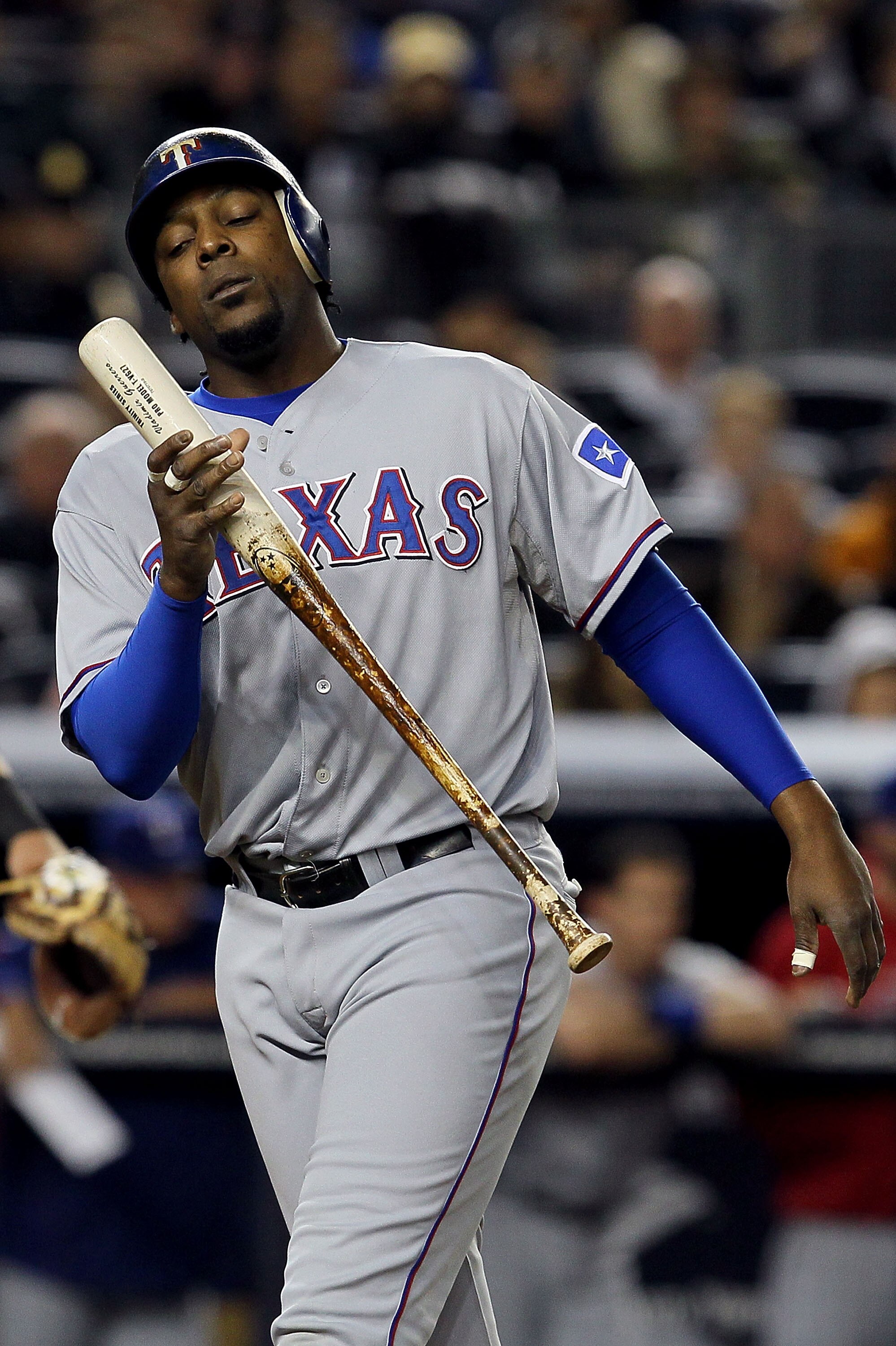 NEW YORK - OCTOBER 19:  Vladimir Guerrero #27 of the Texas Rangers reacts after striking out against the New York Yankees in Game Four of the ALCS during the 2010 MLB Playoffs at Yankee Stadium on October 19, 2010 in the Bronx borough of New York City.  (