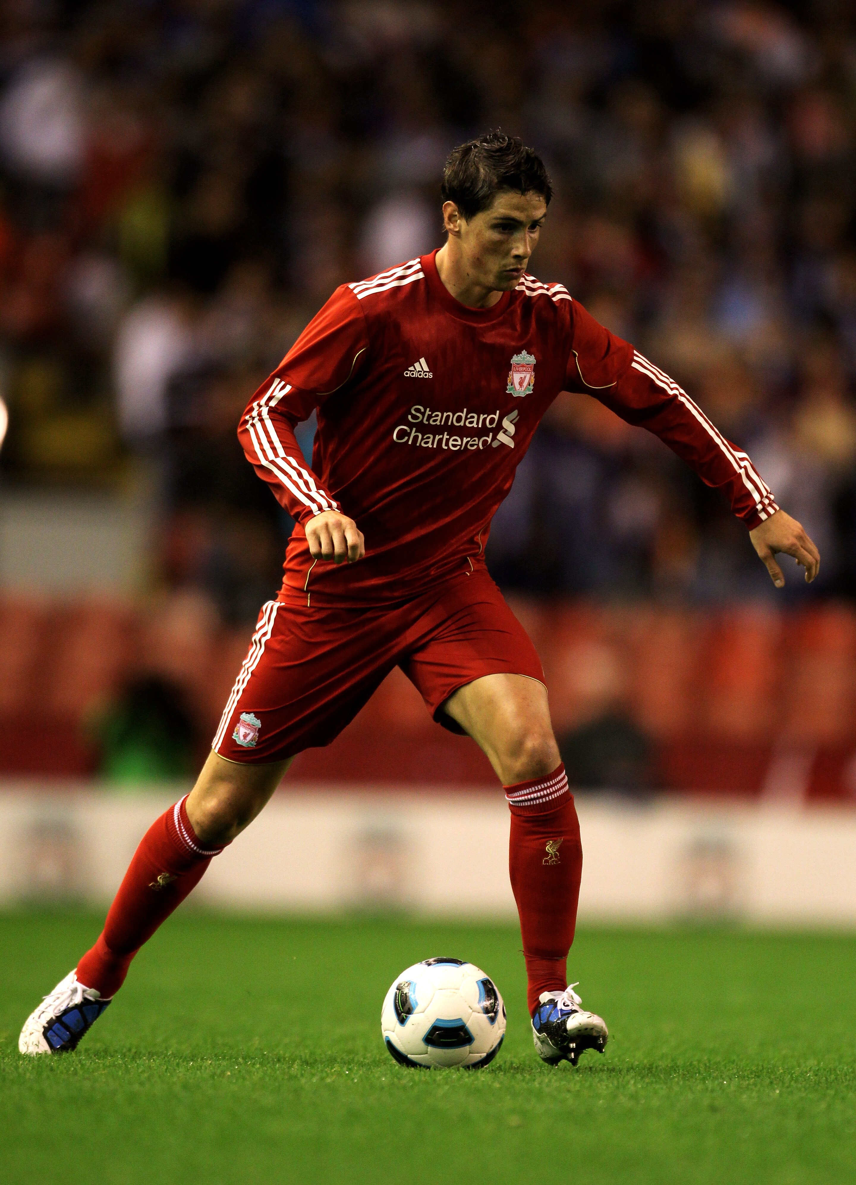 LIVERPOOL, ENGLAND - AUGUST 19:  Fernando Torres of Liverpool in action during the UEFA Europa League play-off first leg match beteween Liverpool and Trabzonspor at Anfield on August 19, 2010 in Liverpool, England.  (Photo by Alex Livesey/Getty Images)