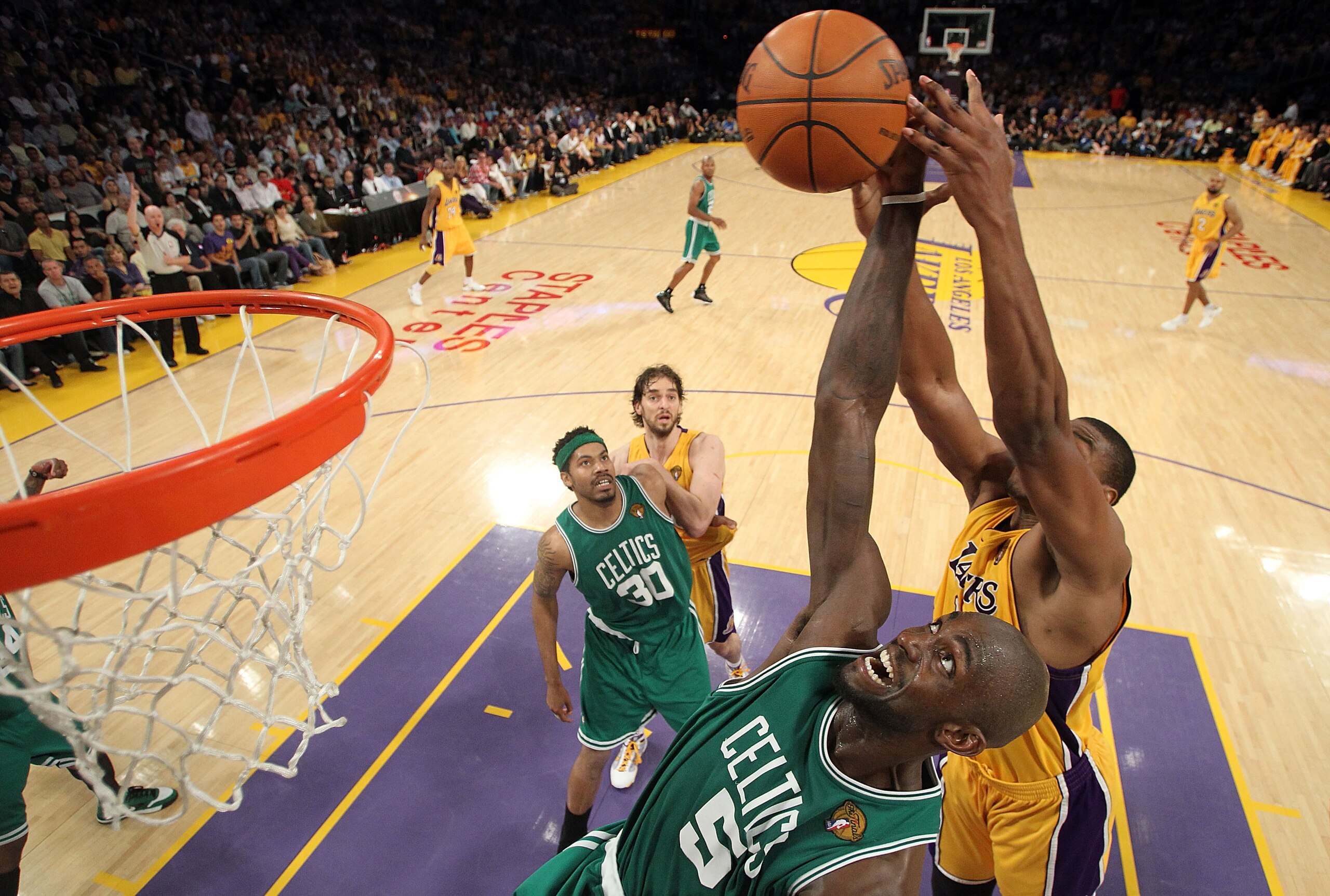 LOS ANGELES, CA - JUNE 17:  Kevin Garnett #5 of the Boston Celtics goes up for the ball in front of Andrew Bynum #17 of the Los Angeles Lakers in Game Seven of the 2010 NBA Finals at Staples Center on June 17, 2010 in Los Angeles, California.  NOTE TO USE