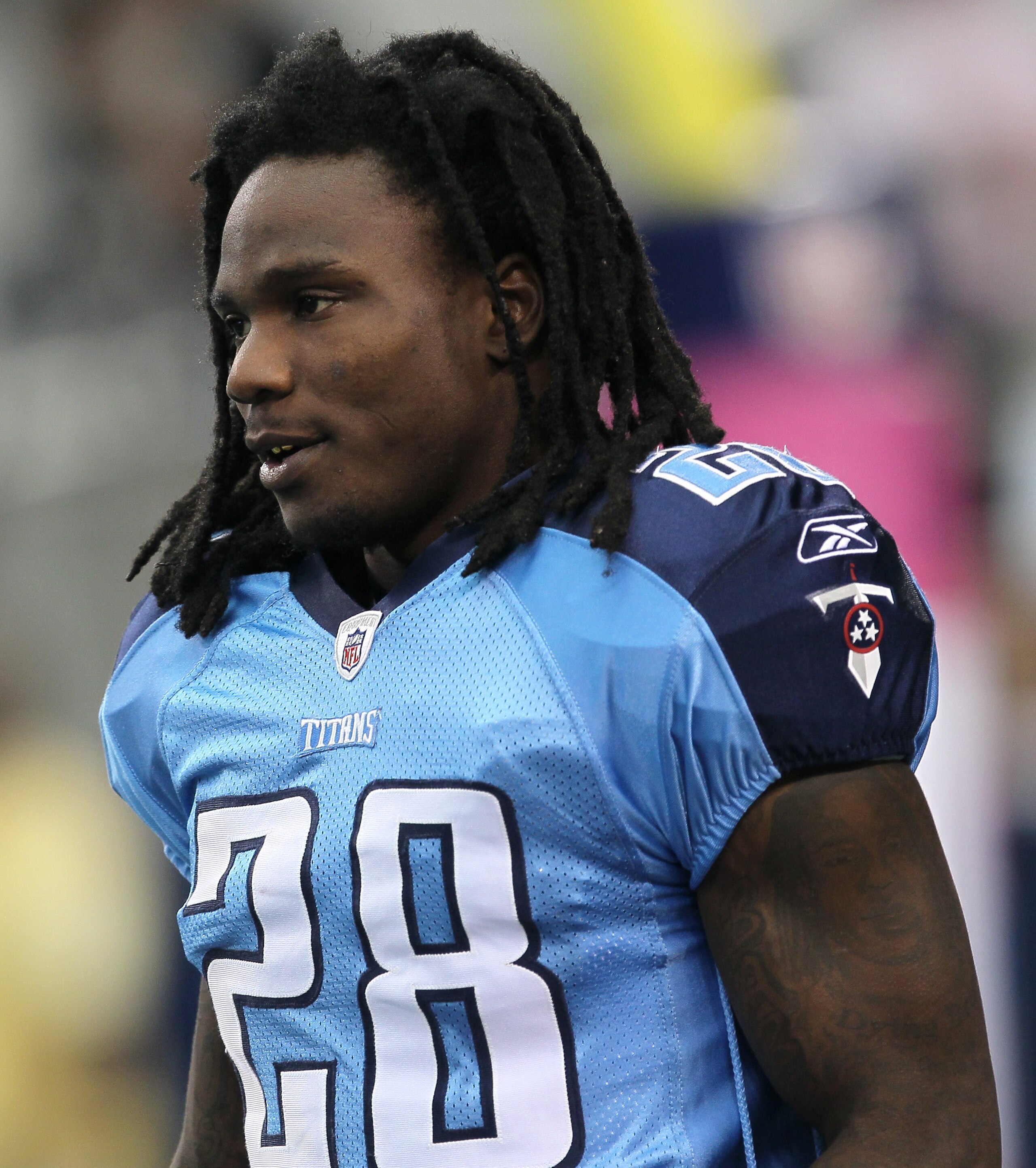 ARLINGTON, TX - OCTOBER 10:  Running back Chris Johnson #28 of the Tennessee Titans warms up for the game with the Dallas Cowboys at Cowboys Stadium on October 10, 2010 in Arlington, Texas.  (Photo by Stephen Dunn/Getty Images)