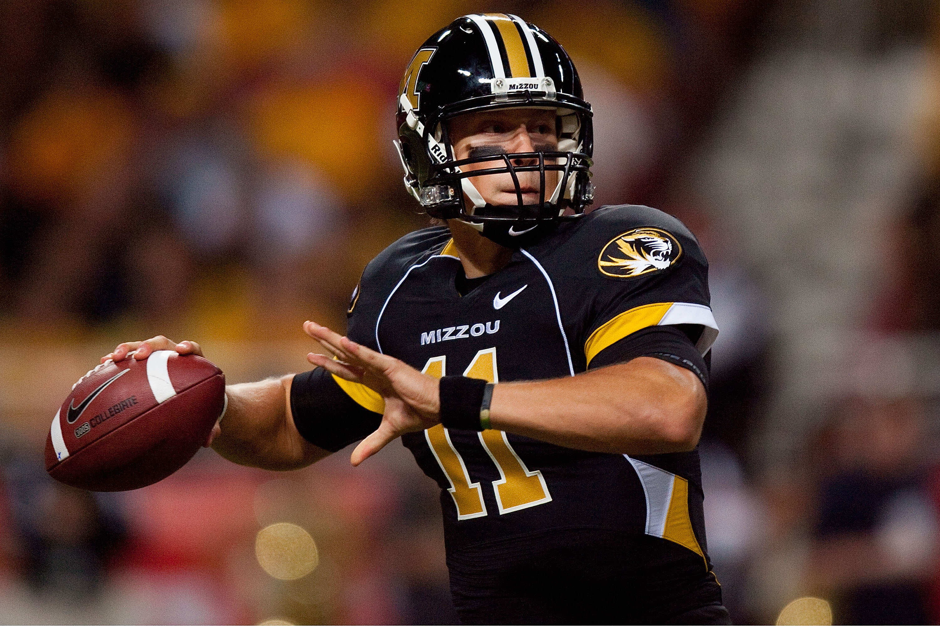 ST. LOUIS - SEPTEMBER 4: Blaine Gabbert #11 of the University of Missouri Tigers looks to pass against the University of Illinois Fighting Illini during the State Farm Arch Rivalry game on September 4, 2010 at the Edward Jones Dome in St. Louis, Missouri.