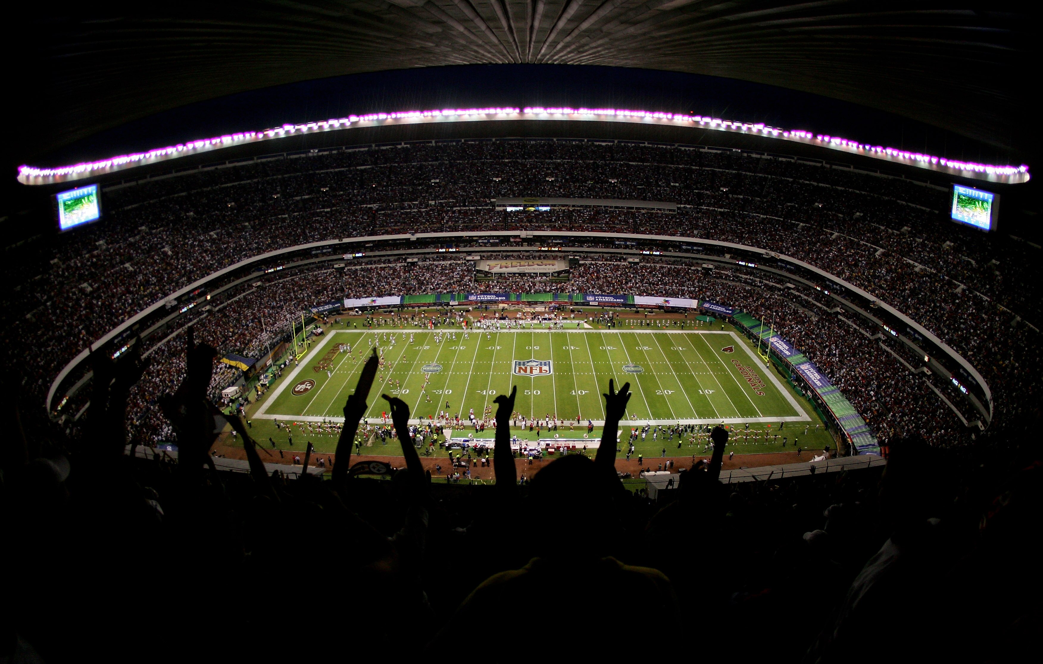 MEXICO CITY - OCTOBER 2:  The fans cheer as the San Francisco 49ers score their first touchdown during the NFL game against the Arizona Cardinals at Estadio Azteca in Mexico City, Mexico.  The Cardinals won 31-14.  (Photo by Robert Laberge/Getty Images)