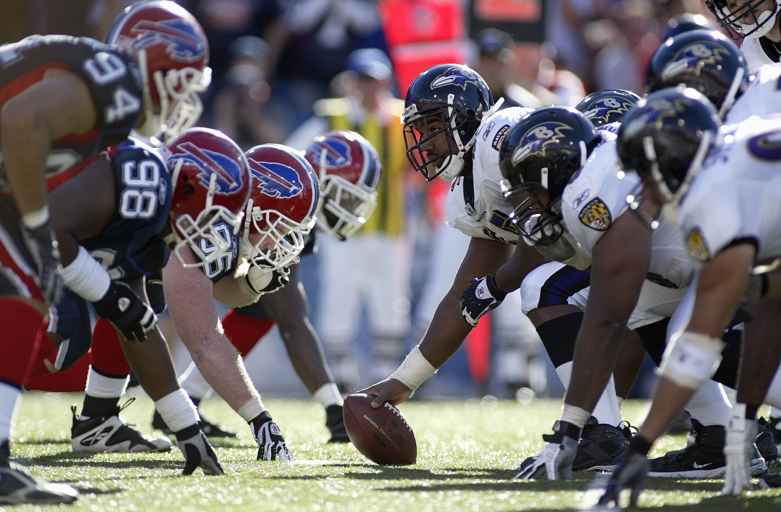 ORCHARD PARK, NY - OCTOBER 21: Chris Chester #65 of the Baltimore Ravens readies to hike the ball during he game agaisnt the Buffalo Bills on October 21, 2007 at Ralph Wilson Stadium in Orchard Park, New York. (Photo by Rick Stewart/Getty Images)