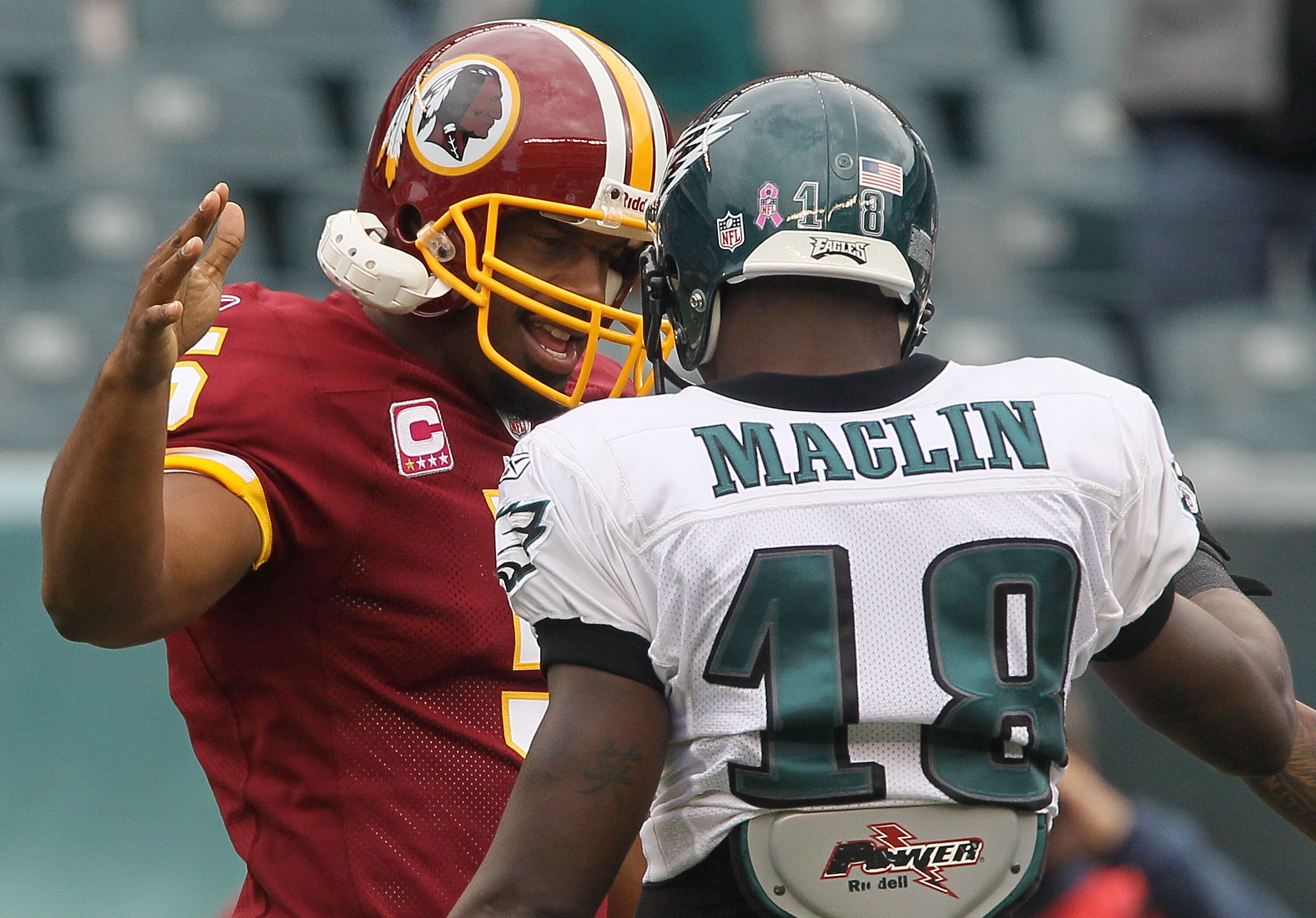 PHILADELPHIA - OCTOBER 03:  Donovan McNabb #5 of the Washington Redskins greets Jeremy Maclin #18 of the Philadelphia Eagles prior to their game on October 3, 2010 at Lincoln Financial Field in Philadelphia, Pennsylvania.  (Photo by Jim McIsaac/Getty Imag