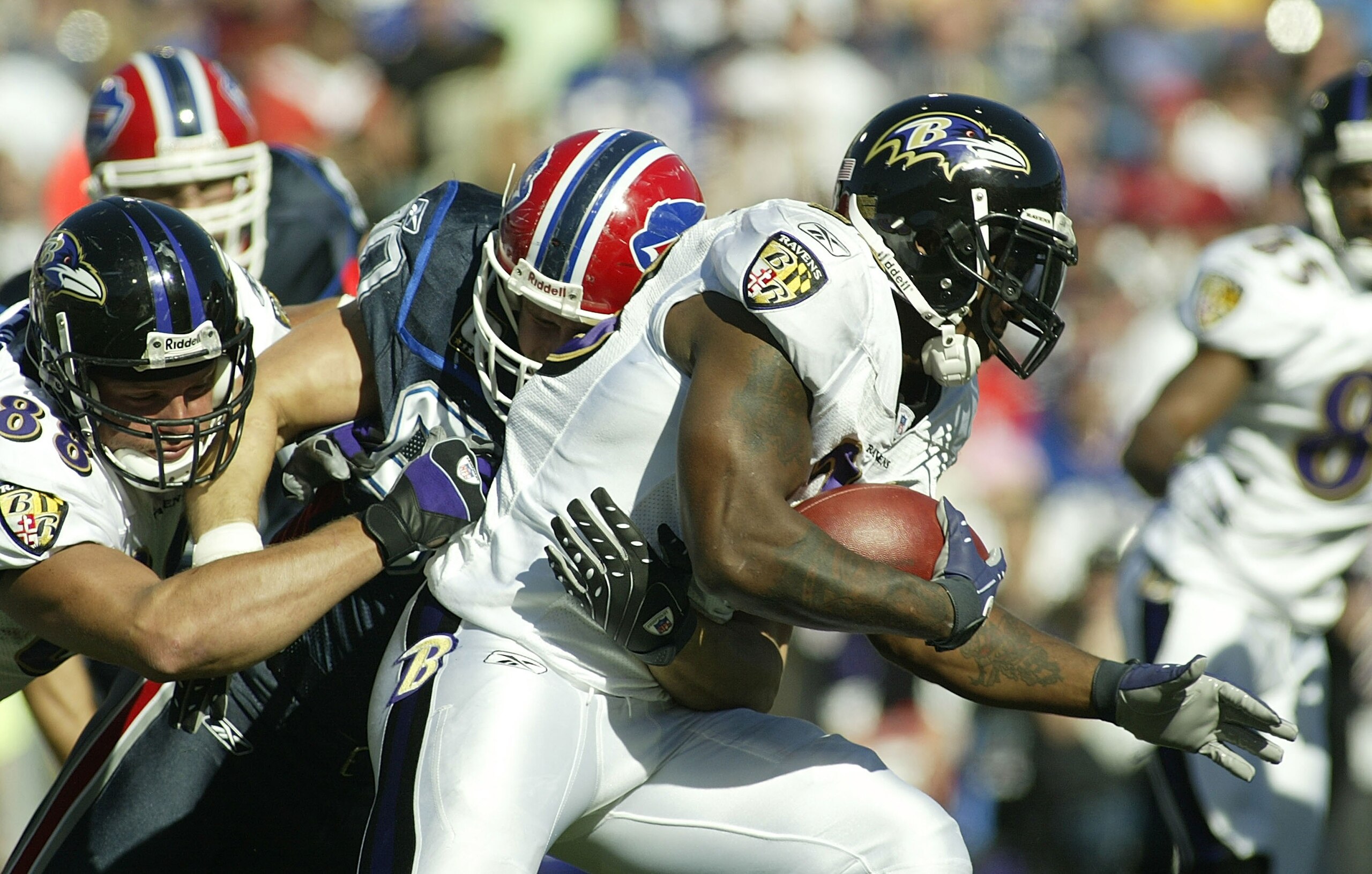 ORCHARD PARK, NY - OCTOBER 21: Willis McGahee #23 of the Baltimore Ravens is tackled by Chris Kelsay #90 of the Buffalo Bills on October 21, 2007 at Ralph Wilson Stadium in Orchard Park, New York. Buffalo won 19-14.(Photo by Rick Stewart/Getty Images)