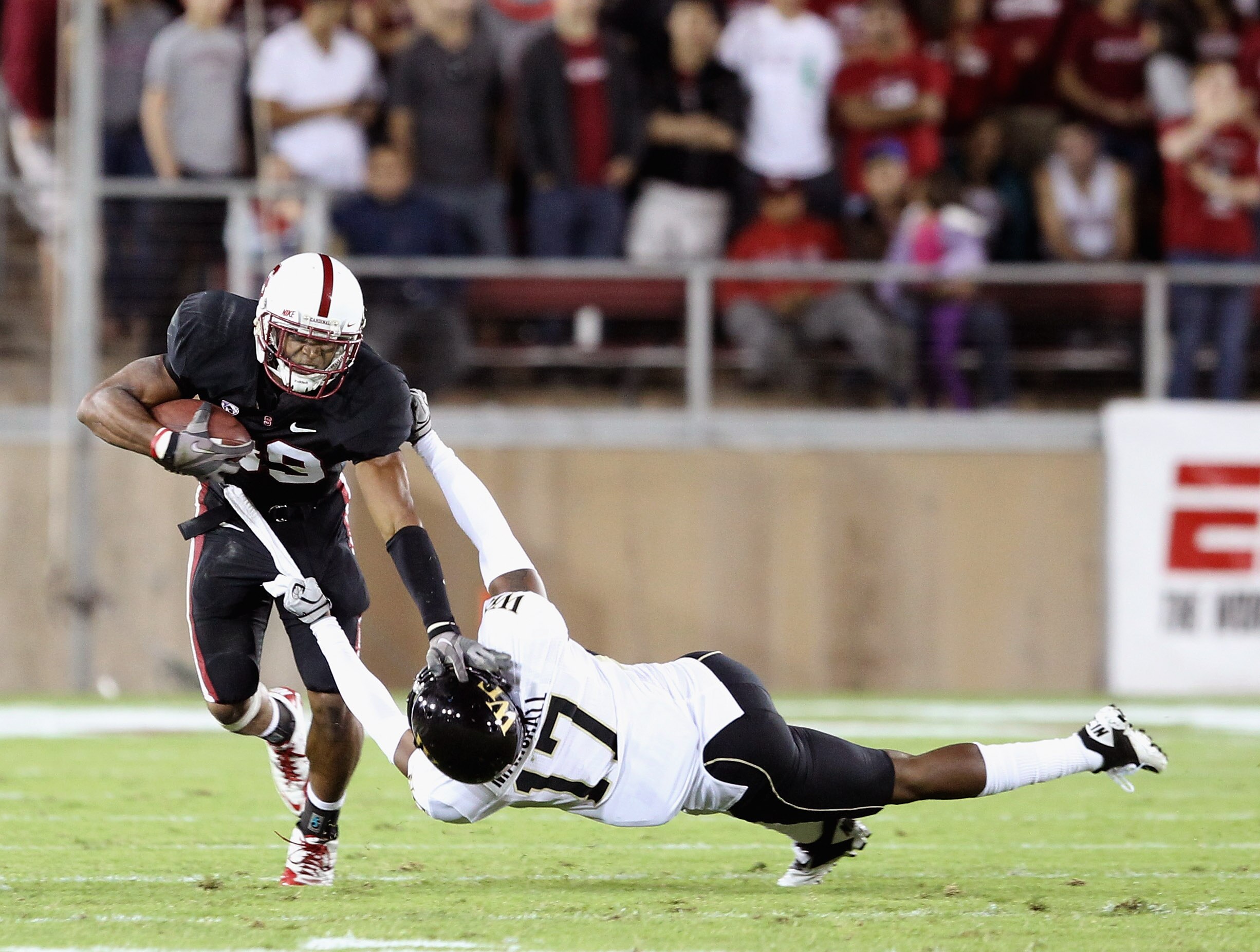 PALO ALTO, CA - SEPTEMBER 18:  Doug Baldwin #89of the Stanford Cardinal tries to fend off A.J. Marshall #17 of the Wake Forest Demon Deacons at Stanford Stadium on September 18, 2010 in Palo Alto, California.  (Photo by Ezra Shaw/Getty Images)