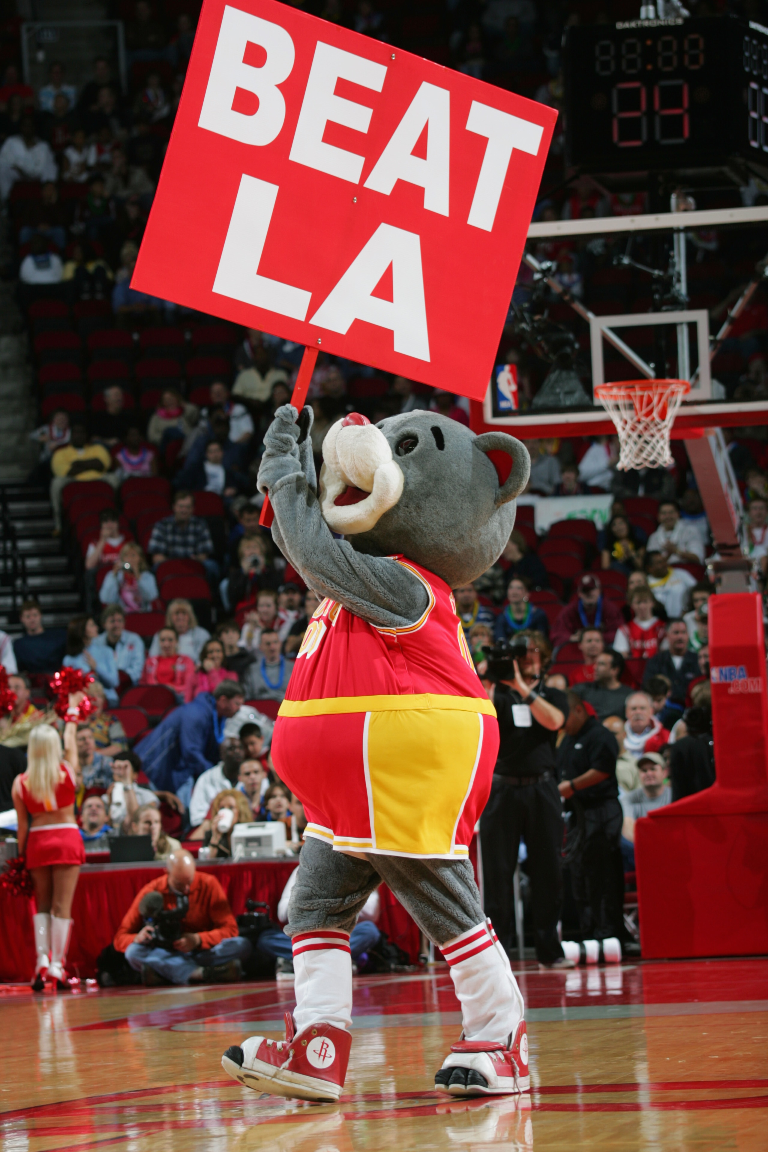 HOUSTON - FEBRUARY 6:  Clutch, the Houston Rockets mascot, hols a 'Beat LA' sign during the game against the Los Angeles Lakers on February 6, 2005 at the Toyota Center in Houston, Texas.  The Rockets won 103-102.  NOTE TO USER: User expressly acknowledge