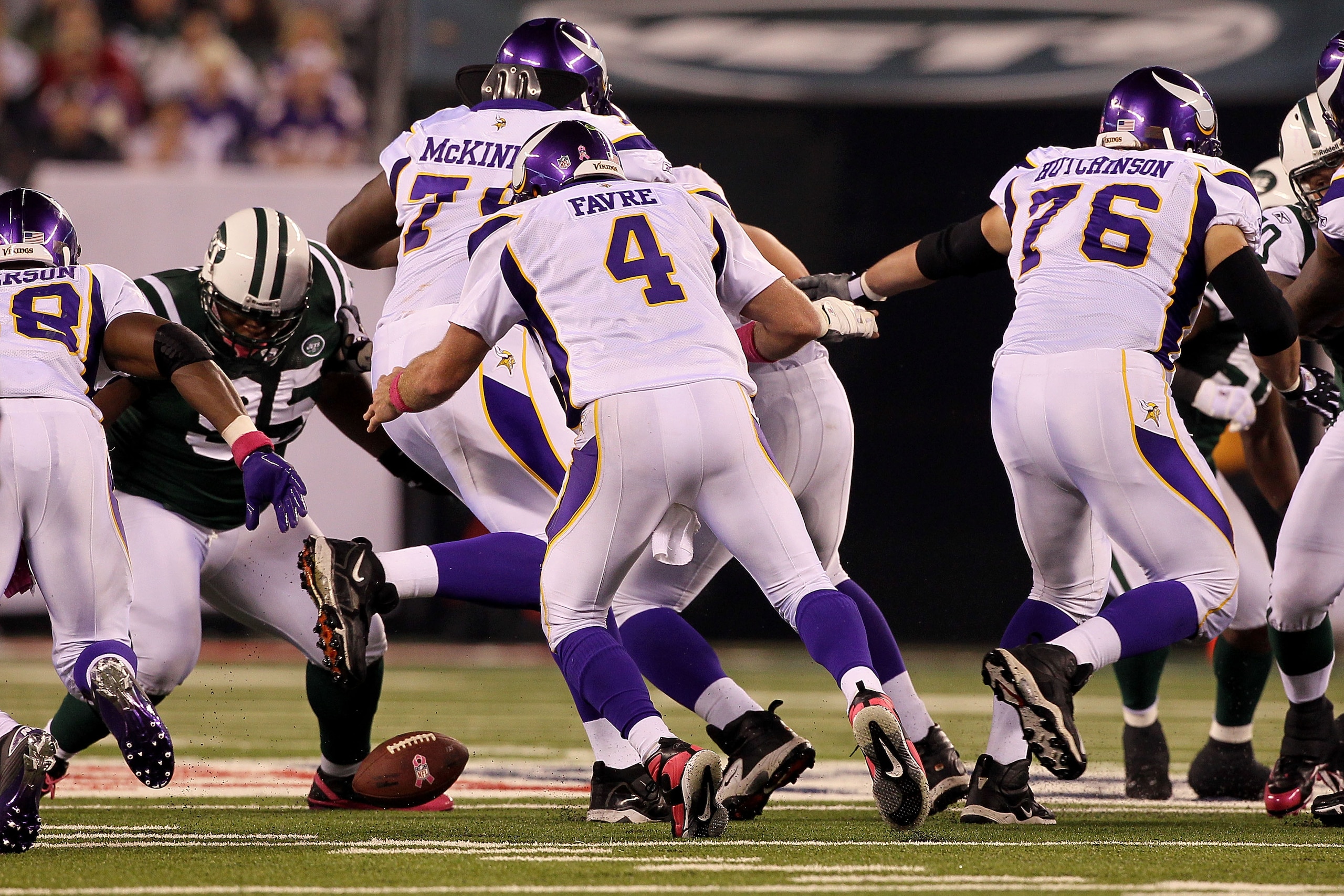 EAST RUTHERFORD, NJ - OCTOBER 11:  Quarterback Brett Favre #4 of the Minnesota Vikings fumbles the ball in the second quarter against the New York Jets at New Meadowlands Stadium on October 11, 2010 in East Rutherford, New Jersey.  (Photo by Jim McIsaac/G