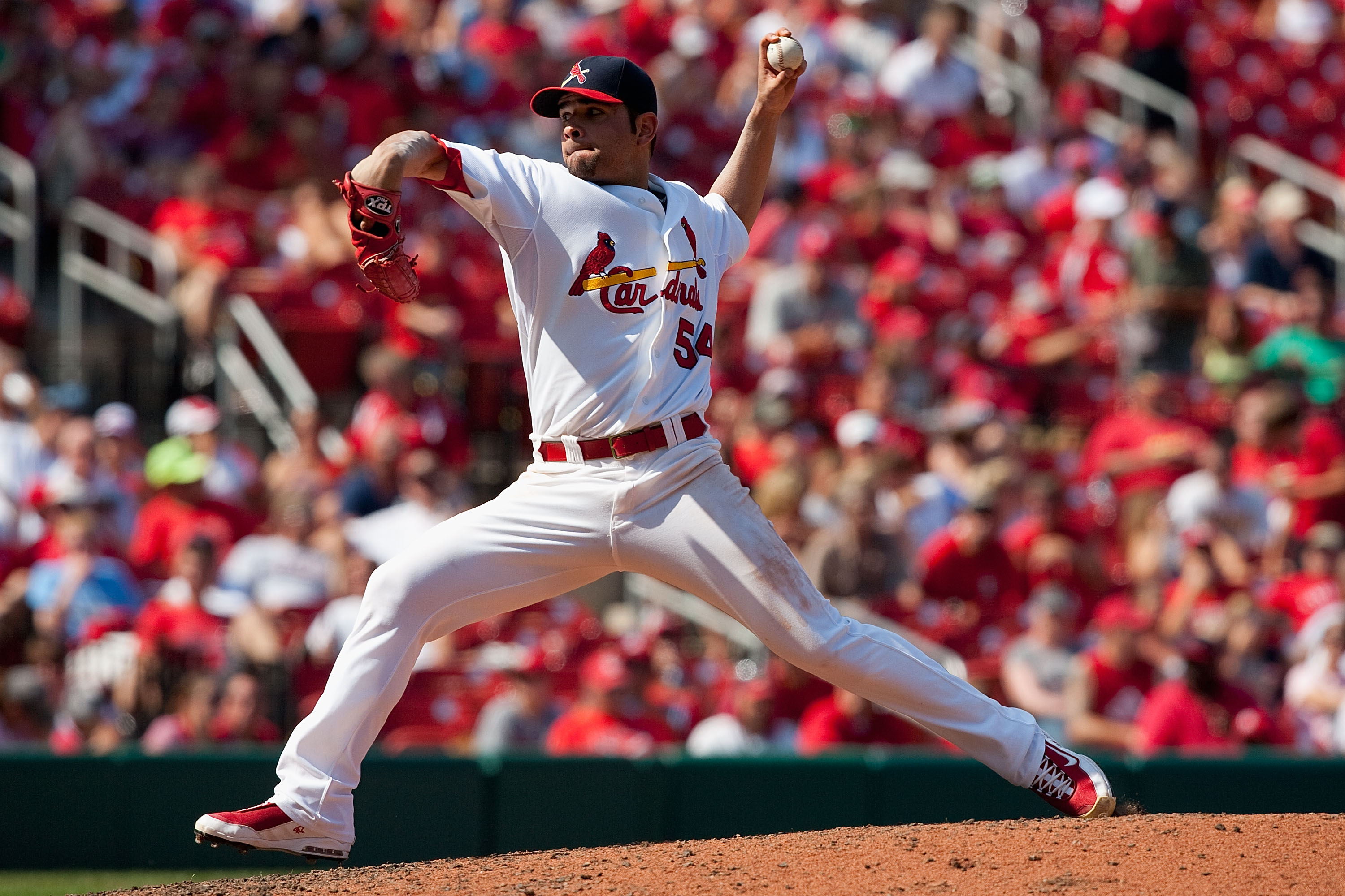 ST. LOUIS - AUGUST 22: Starter Jaime Garcia #54 of the St. Louis Cardinals pitches against the San Francisco Giants at Busch Stadium on August 22, 2010 in St. Louis, Missouri.  (Photo by Dilip Vishwanat/Getty Images)