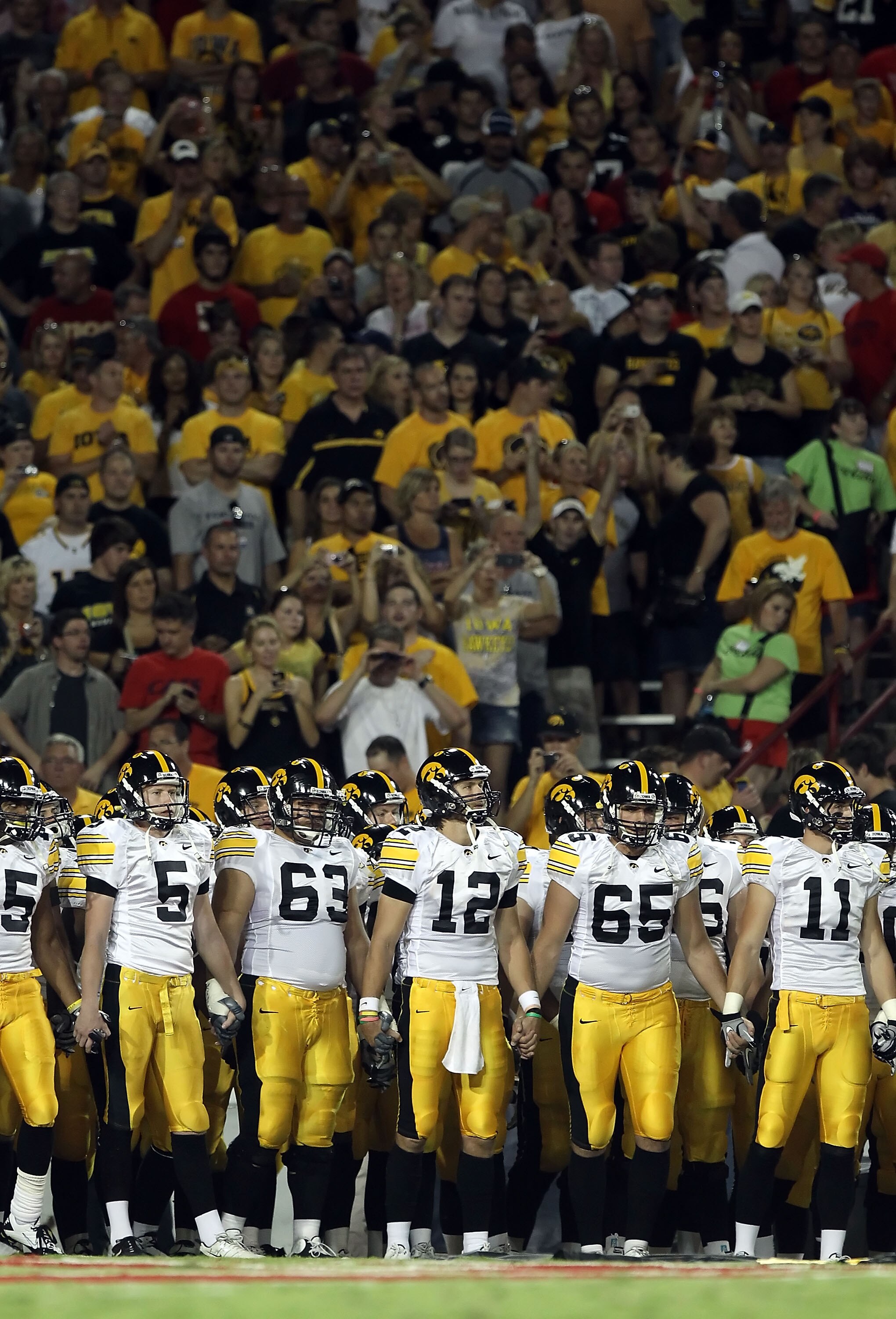 TUCSON, AZ - SEPTEMBER 18:  The Iowa Hawkeyes line up before the college football game against the Arizona Wildcats at Arizona Stadium on September 18, 2010 in Tucson, Arizona. The Wildcats defeated the Hawkeyes 34-27.  (Photo by Christian Petersen/Getty 