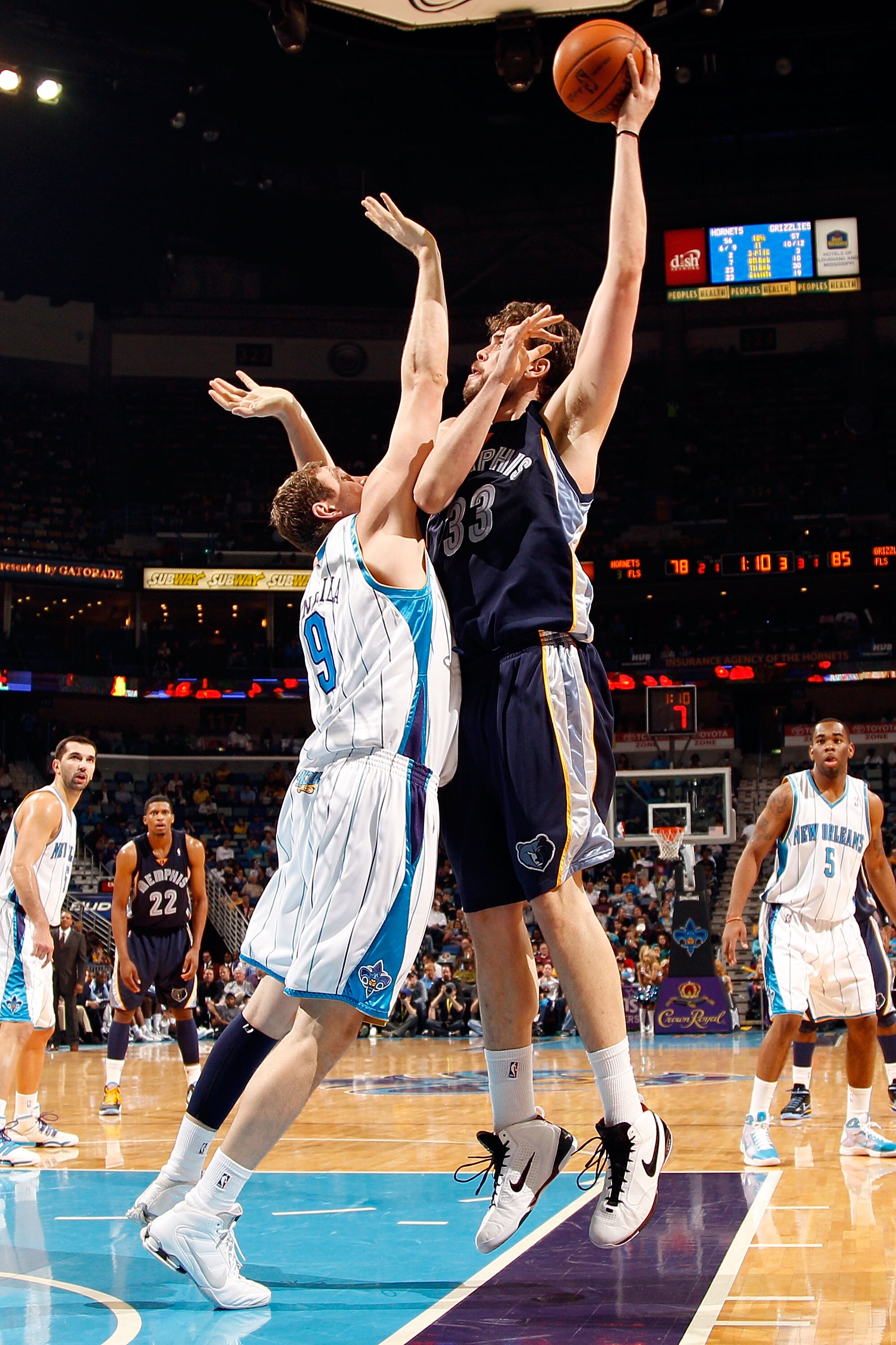 NEW ORLEANS - JANUARY 20:  Marc Gasol #33 of the Memphis Grizzlies shoots the ball over Darius Songaila #9 of the New Orleans Hornets at the New Orleans Arena on January 20, 2010 in New Orleans, Louisiana.  The Hornets defeated the Grizzlies 113-111.  NOT