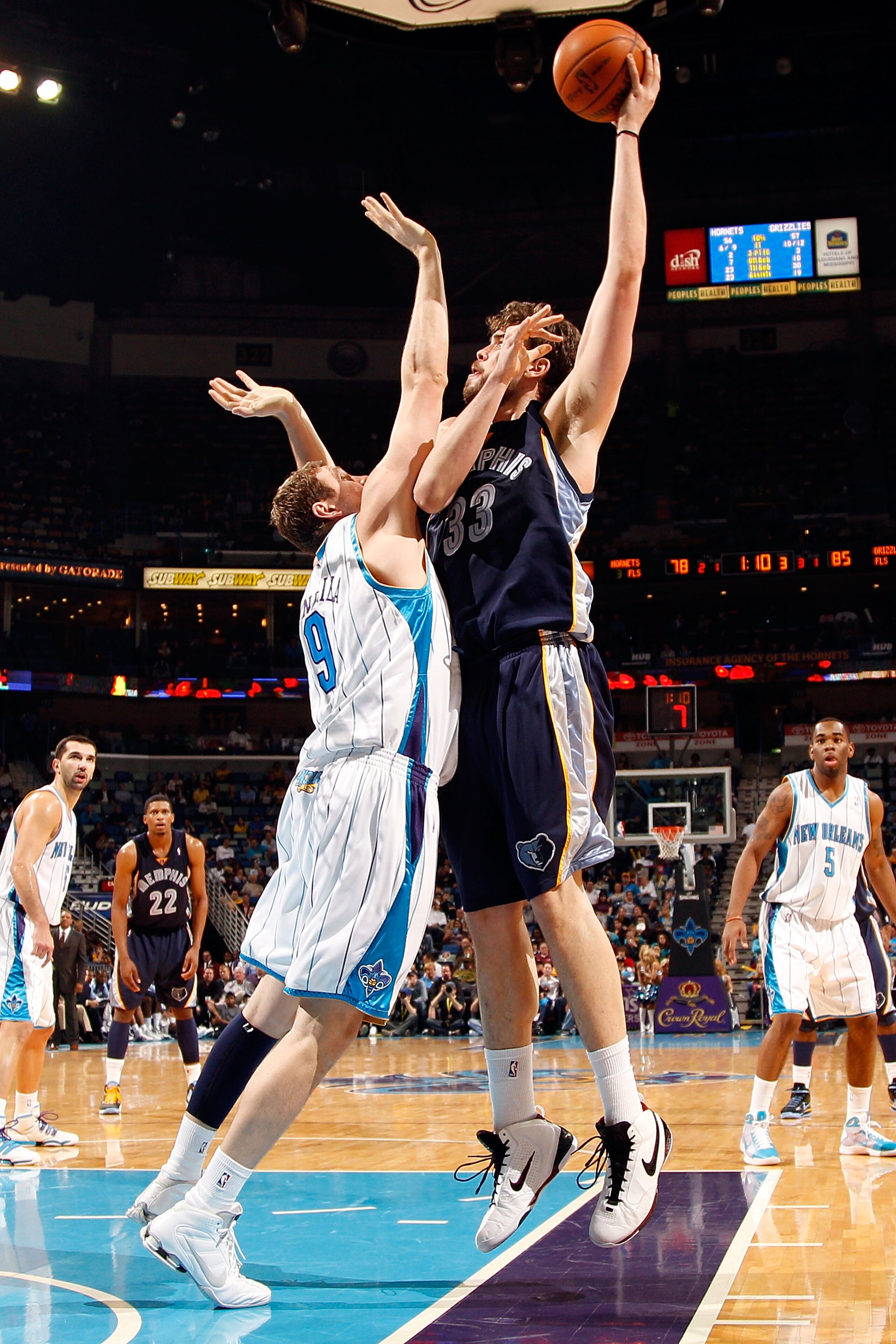 NEW ORLEANS - JANUARY 20:  Marc Gasol #33 of the Memphis Grizzlies shoots the ball over Darius Songaila #9 of the New Orleans Hornets at the New Orleans Arena on January 20, 2010 in New Orleans, Louisiana.  The Hornets defeated the Grizzlies 113-111.  NOT