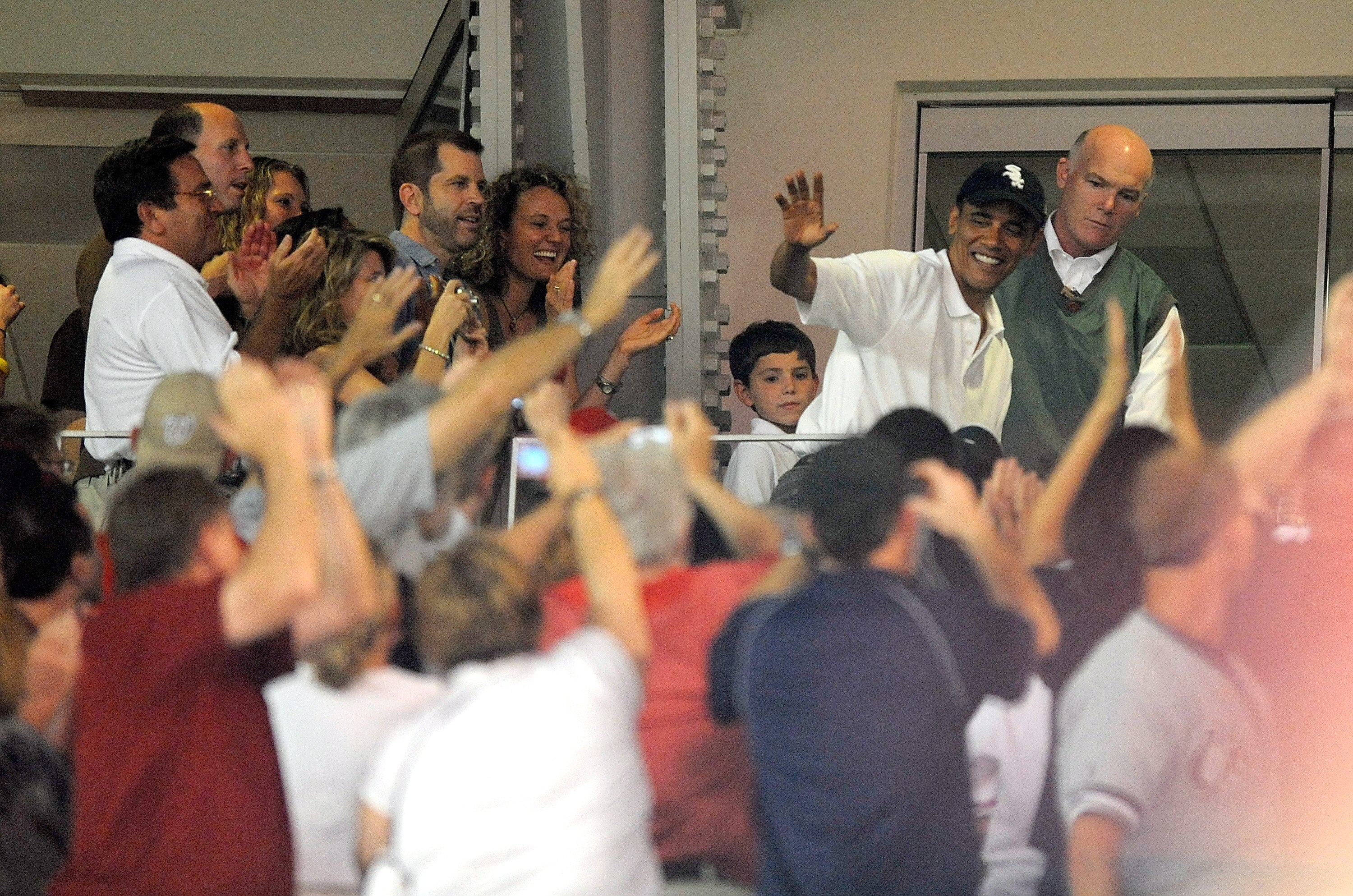 WASHINGTON - JUNE 18:  US President Barack Obama waves to fans during the game between the Washington Nationals and the Chicago White Sox at Nationals Park on June 18, 2010 in Washington, DC.  (Photo by Greg Fiume/Getty Images)