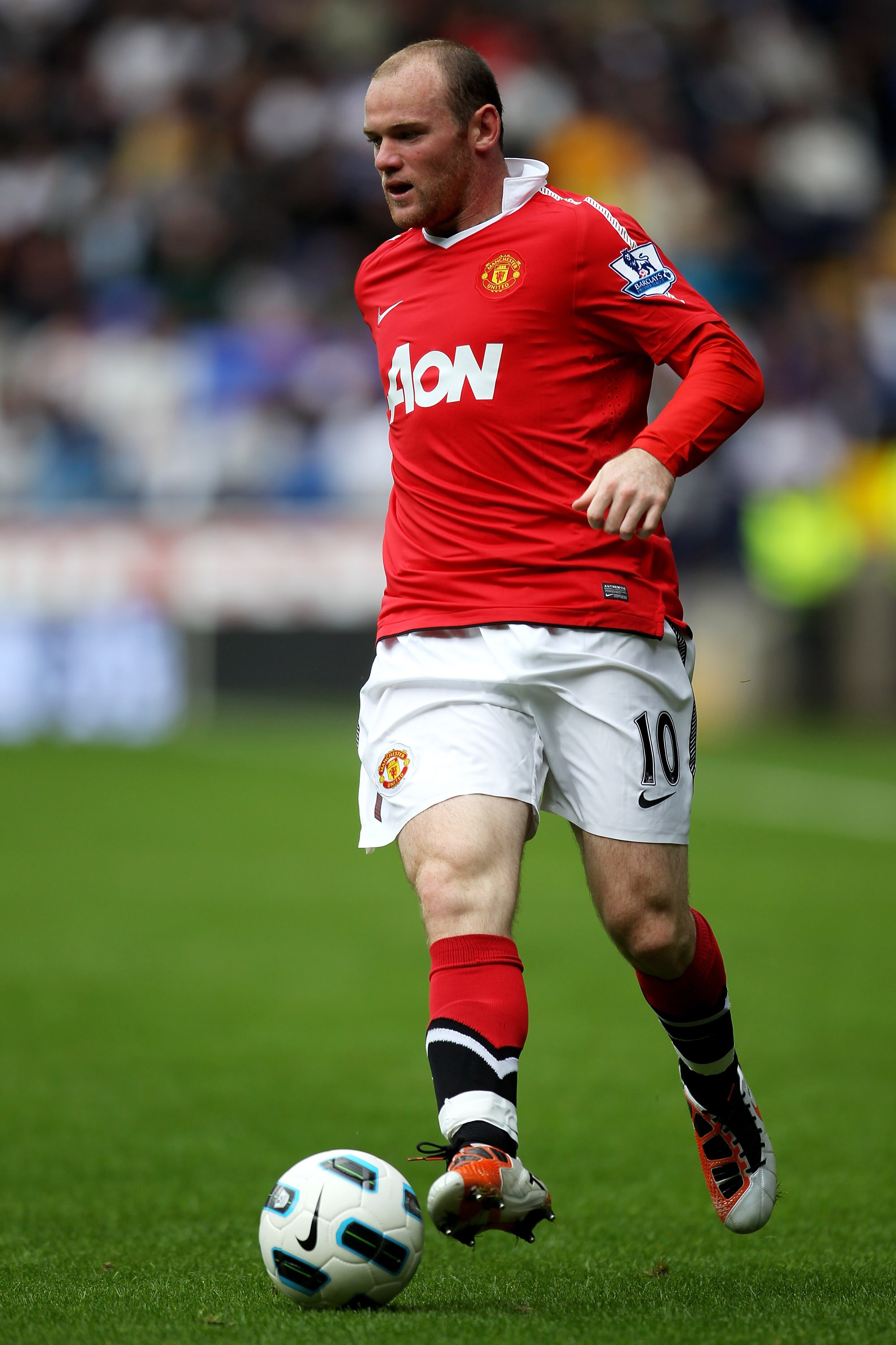 BOLTON, ENGLAND - SEPTEMBER 26:  Wayne Rooney of Manchester United in action during the Barclays Premier League match between Bolton Wanderers and Manchester United at the Reebok Stadium on September 26, 2010 in Bolton, England. (Photo by Alex Livesey/Get
