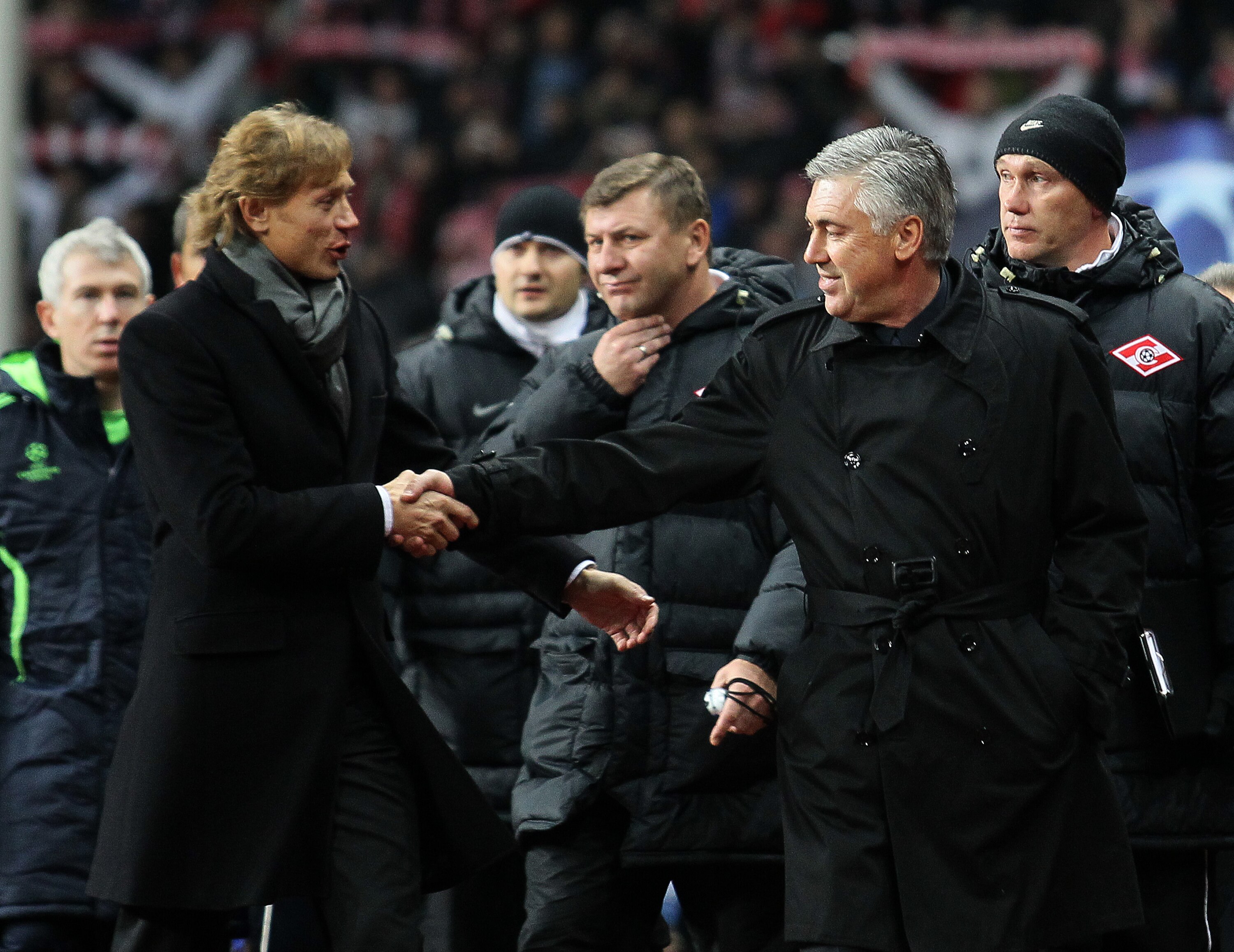 MOSCOW, RUSSIA - OCTOBER 19: Spartak Moscow Head Coach Valeri Karpin shakes hands with Chelsea Manager Carlo Ancelotti (R) prior to the UEFA Champions League Group F match between FC Spartak Moscow and Chelsea  at the Luzhniki Stadium on October 19, 2010