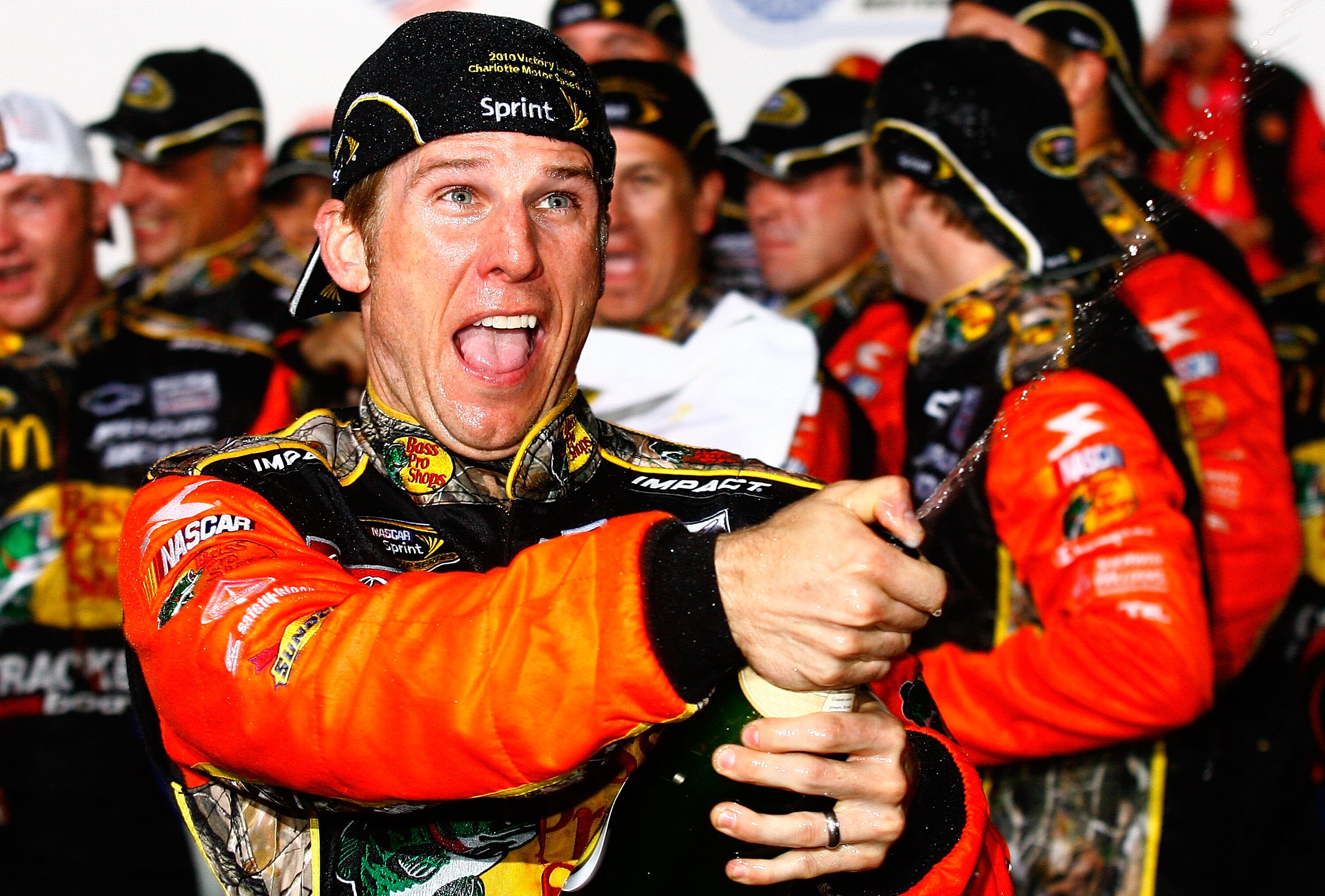 CONCORD, NC - OCTOBER 16:  Jamie McMurray, driver of the #1 Bass Pro Shops/Tracker Boats Chevrolet, celebrates in Victory Lane after winning the NASCAR Sprint Cup Series Bank of America 500 at Charlotte Motor Speedway on October 16, 2010 in Concord, North
