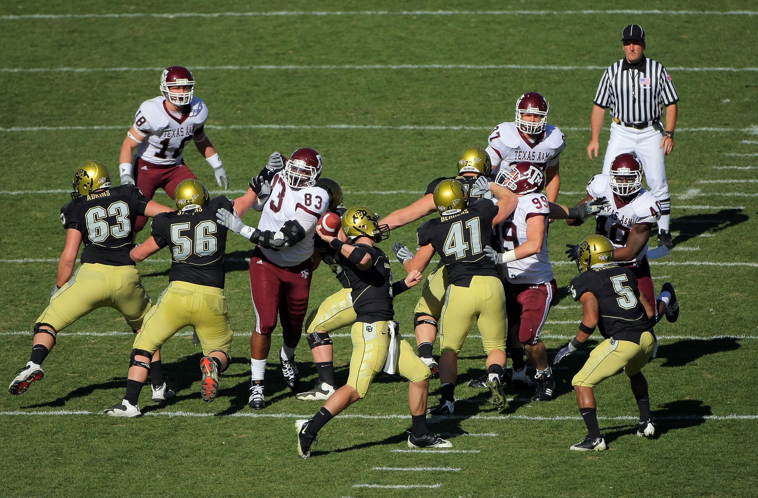 BOULDER, CO - NOVEMBER 07:  Quarterback Tyler Hansen #9 of the Colorado Buffaloes delivers a pass against the Texas A&M Aggies during NCAA college football action at Folsom Field on November 7, 2009 in Boulder, Colorado. Colorado defeated Texas A&M 35-34.