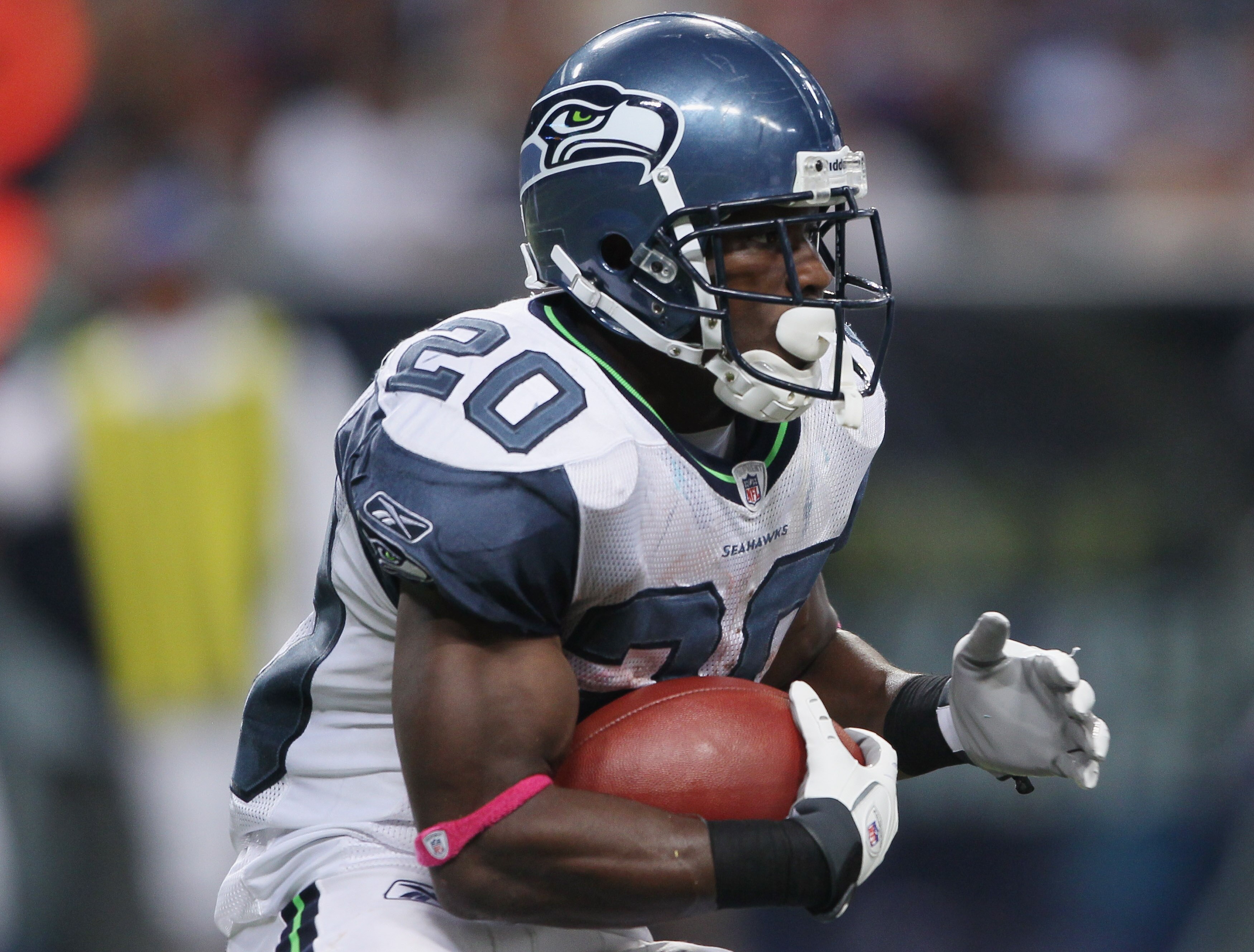 ST. LOUIS - OCTOBER 03:  :  Justin Forsett #20 of the Seattle Seahawks carries the ball in the first half against the St. Louis Rams on October 3, 2010 at Edward Jones Dome in St. Louis, Missouri.  (Photo by Elsa/Getty Images)