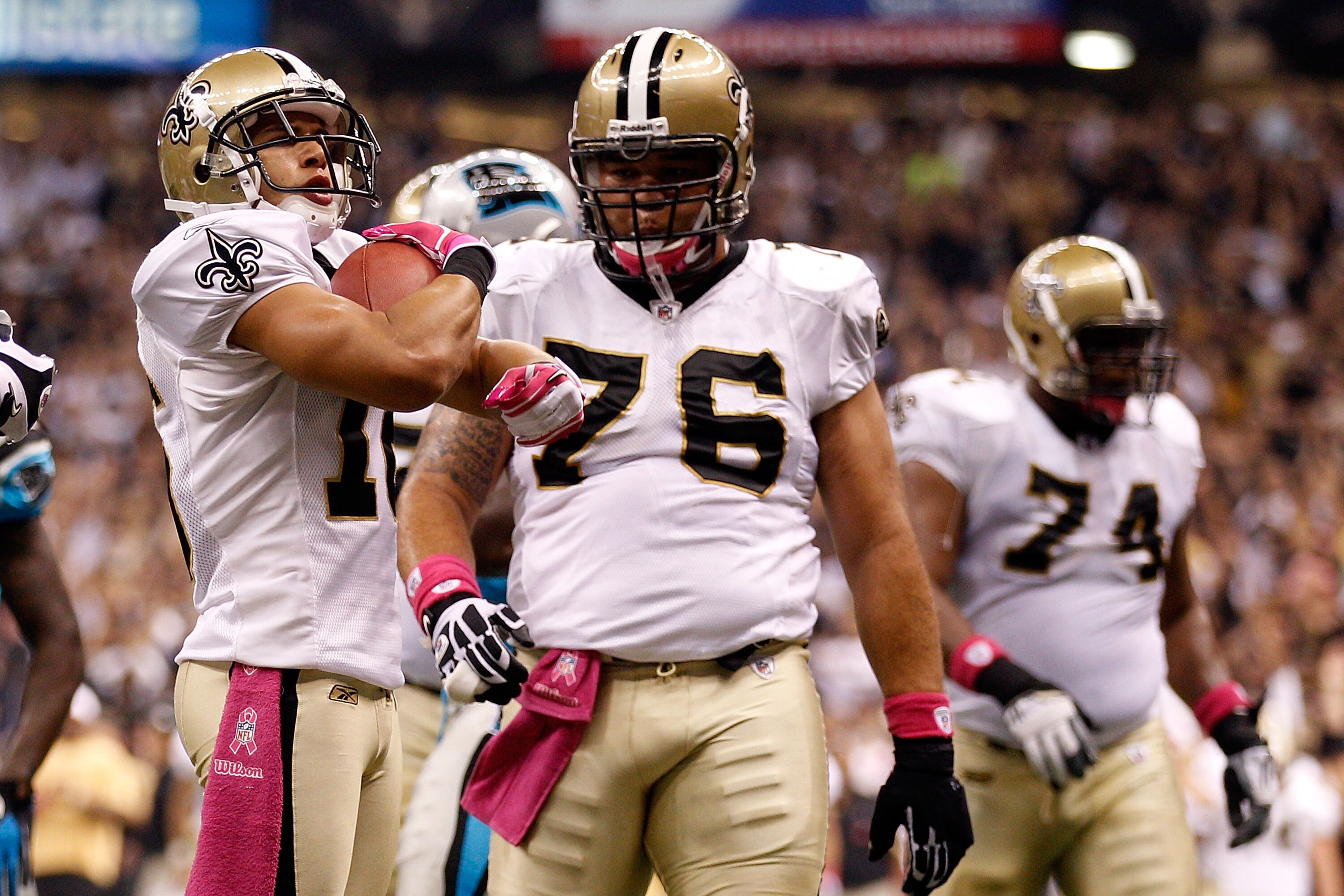 NEW ORLEANS - OCTOBER 03:  Lance Moore #16 of the New Orleans Saints celebrates after scoring a touchdown against the Carolina Panthers at the Louisiana Superdome on October 3, 2010 in New Orleans, Louisiana.  (Photo by Chris Graythen/Getty Images)