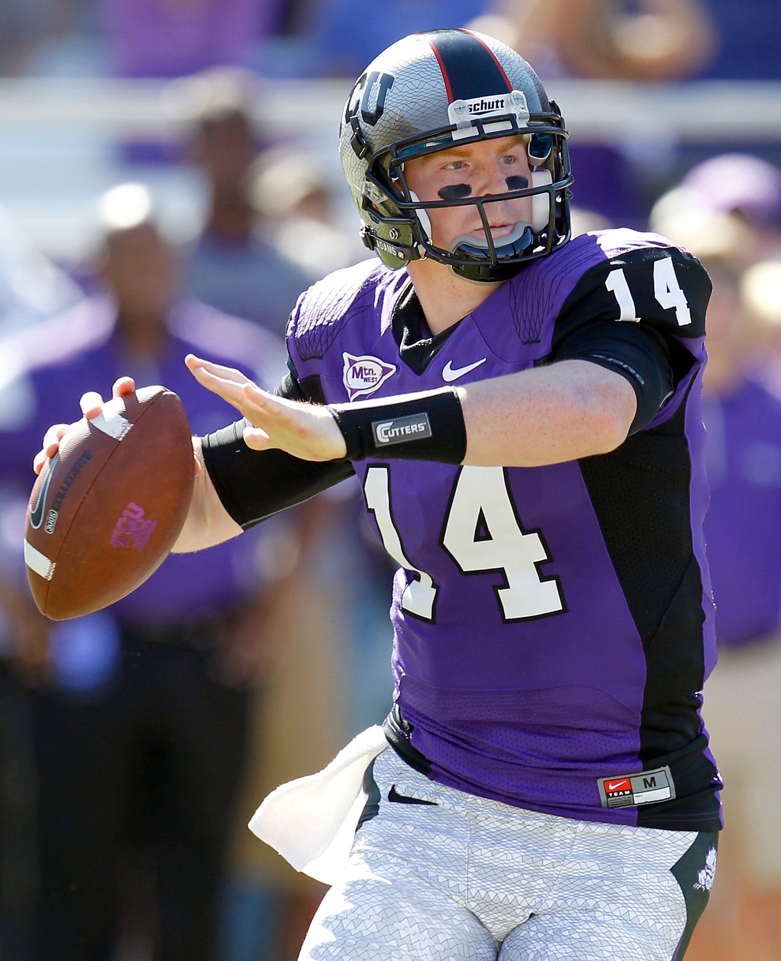 FORT WORTH, TX - OCTOBER 16: Quarterback Andy Dalton #14 of the TCU Horned Frogs looks for a receiver against the BYU Cougars at Amon G. Carter Stadium on October 16, 2010 in Fort Worth, Texas. (Photo by Tom Pennington/Getty Images) FORT WORTH, TX - OCTOBER 16: Quarterback Andy Dalton #14 of the TCU Horned Frogs looks for a receiver against the BYU Cougars at Amon G. Carter Stadium on October 16, 2010 in Fort Worth, Texas. (Photo by Tom Pennington/Getty Images)