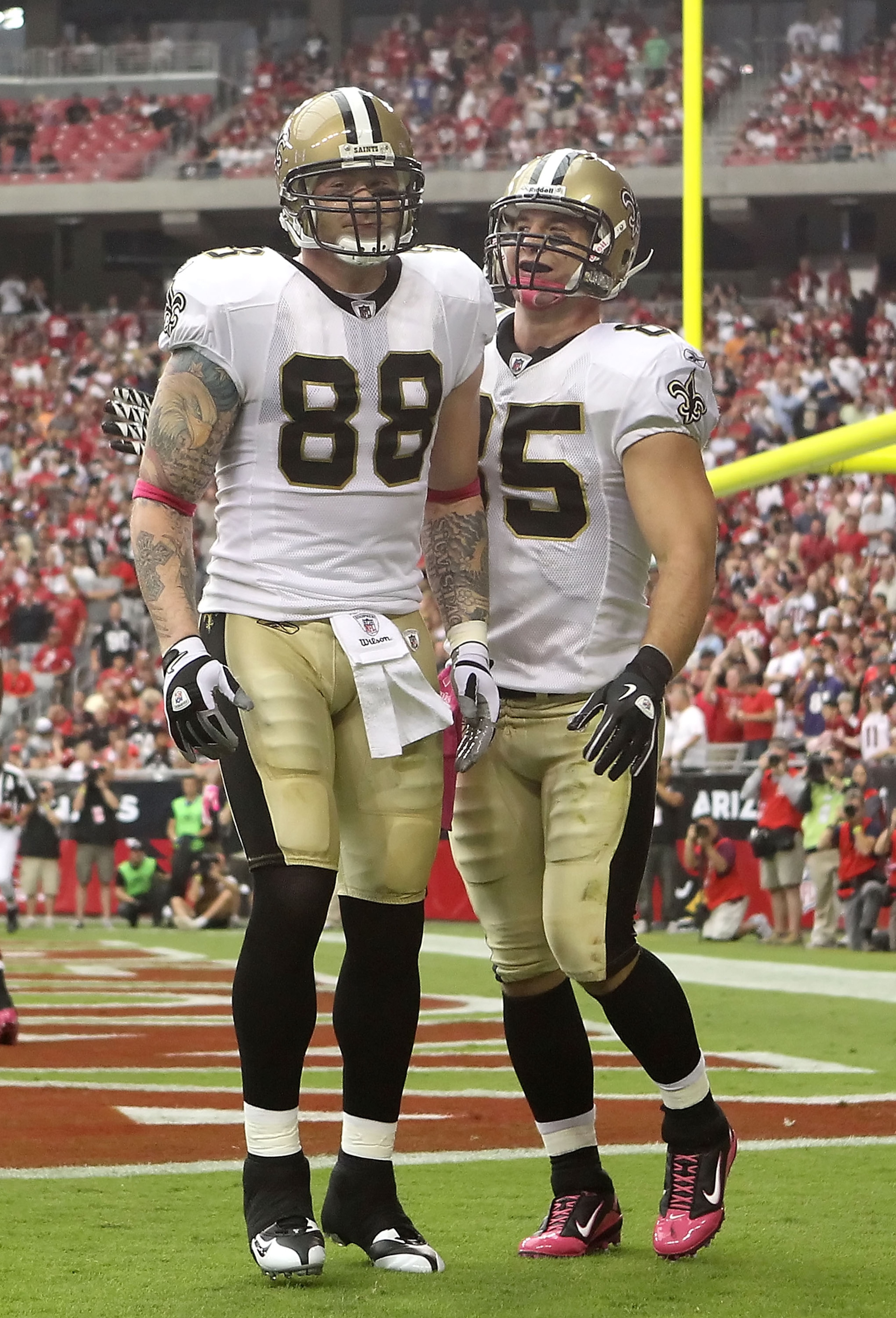 GLENDALE, AZ - OCTOBER 10: Tight end Jeremy Shockey #88 of the New Orleans Saints celebrates with teammate David Thomas #85 after Shockey caught a 1 yard touchdown reception against the Arizona Cardinals during the first quarter of the NFL game at the Un GLENDALE, AZ - OCTOBER 10: Tight end Jeremy Shockey #88 of the New Orleans Saints celebrates with teammate David Thomas #85 after Shockey caught a 1 yard touchdown reception against the Arizona Cardinals during the first quarter of the NFL game at the Un
