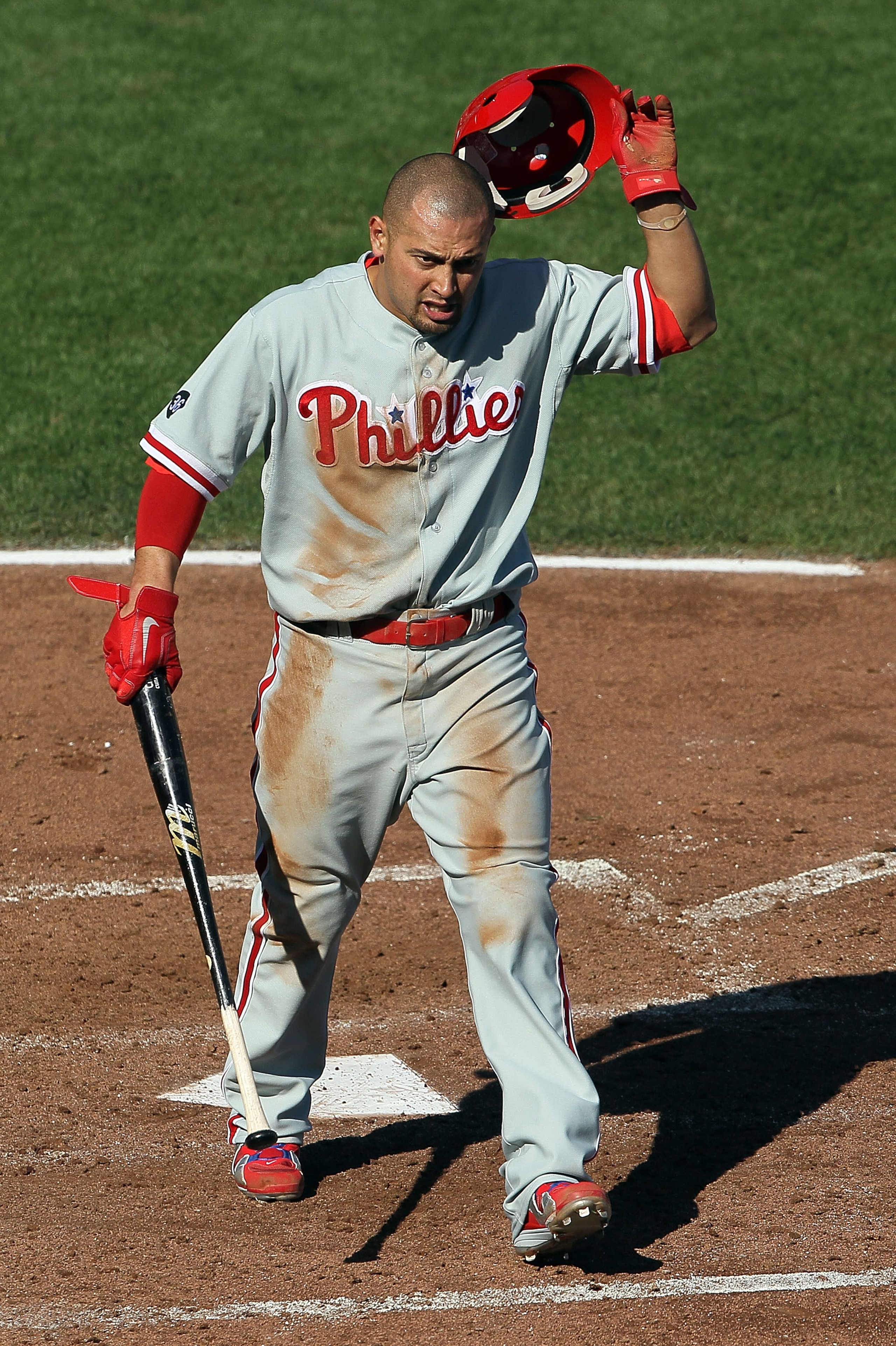 SAN FRANCISCO - OCTOBER 19:  Shane Victorino #8 of the Philadelphia Phillies reacts while at bat against the San Francisco Giants in Game Three of the NLCS during the 2010 MLB Playoffs at AT&T Park on October 19, 2010 in San Francisco, California.  (Photo