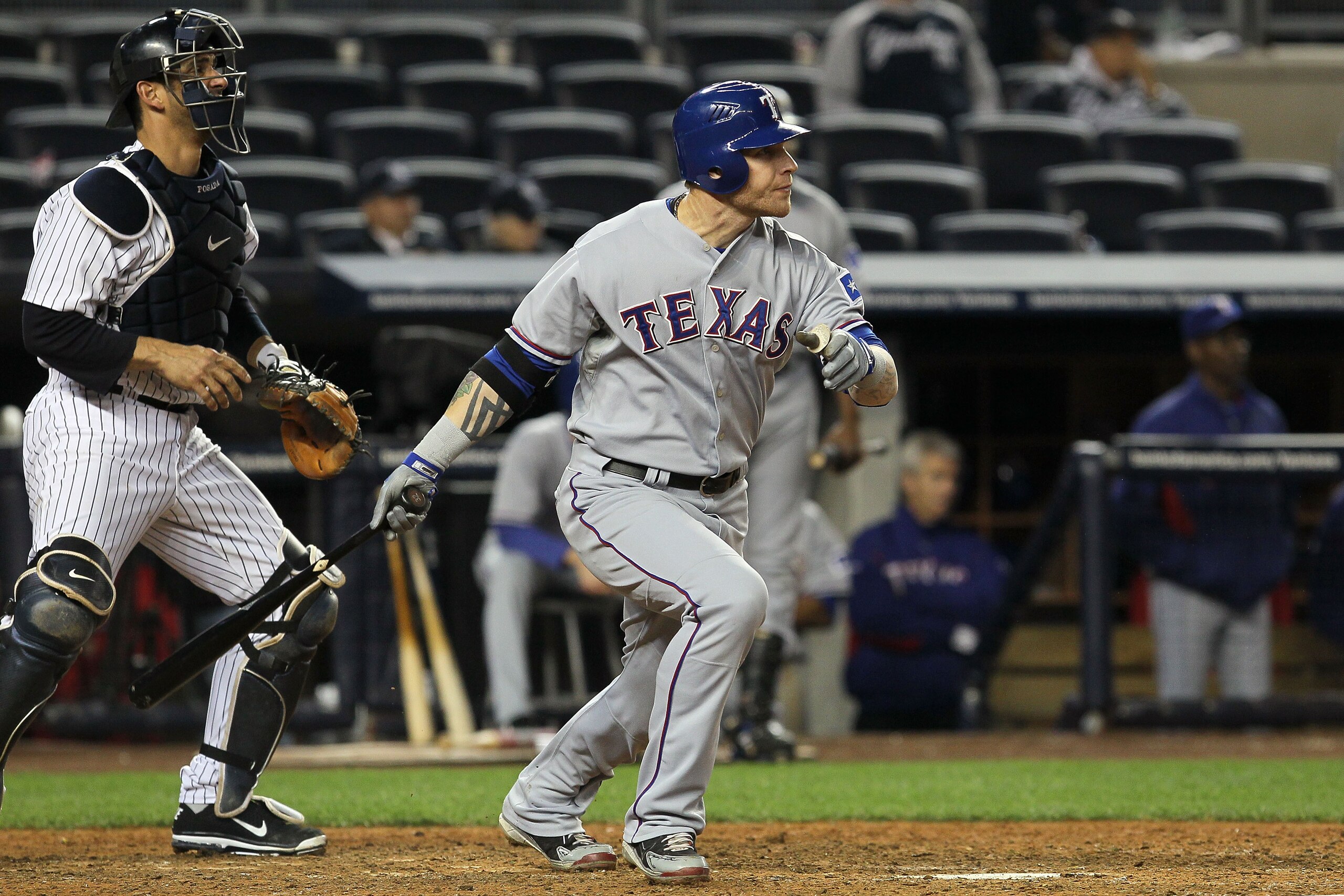 NEW YORK - OCTOBER 19: Josh Hamilton #32 of the Texas Rangers hits a solo homerun in the ninth inning against the New York Yankees in Game Four of the ALCS during the 2010 MLB Playoffs at Yankee Stadium on October 19, 2010 in the Bronx borough of New Yor NEW YORK - OCTOBER 19: Josh Hamilton #32 of the Texas Rangers hits a solo homerun in the ninth inning against the New York Yankees in Game Four of the ALCS during the 2010 MLB Playoffs at Yankee Stadium on October 19, 2010 in the Bronx borough of New Yor
