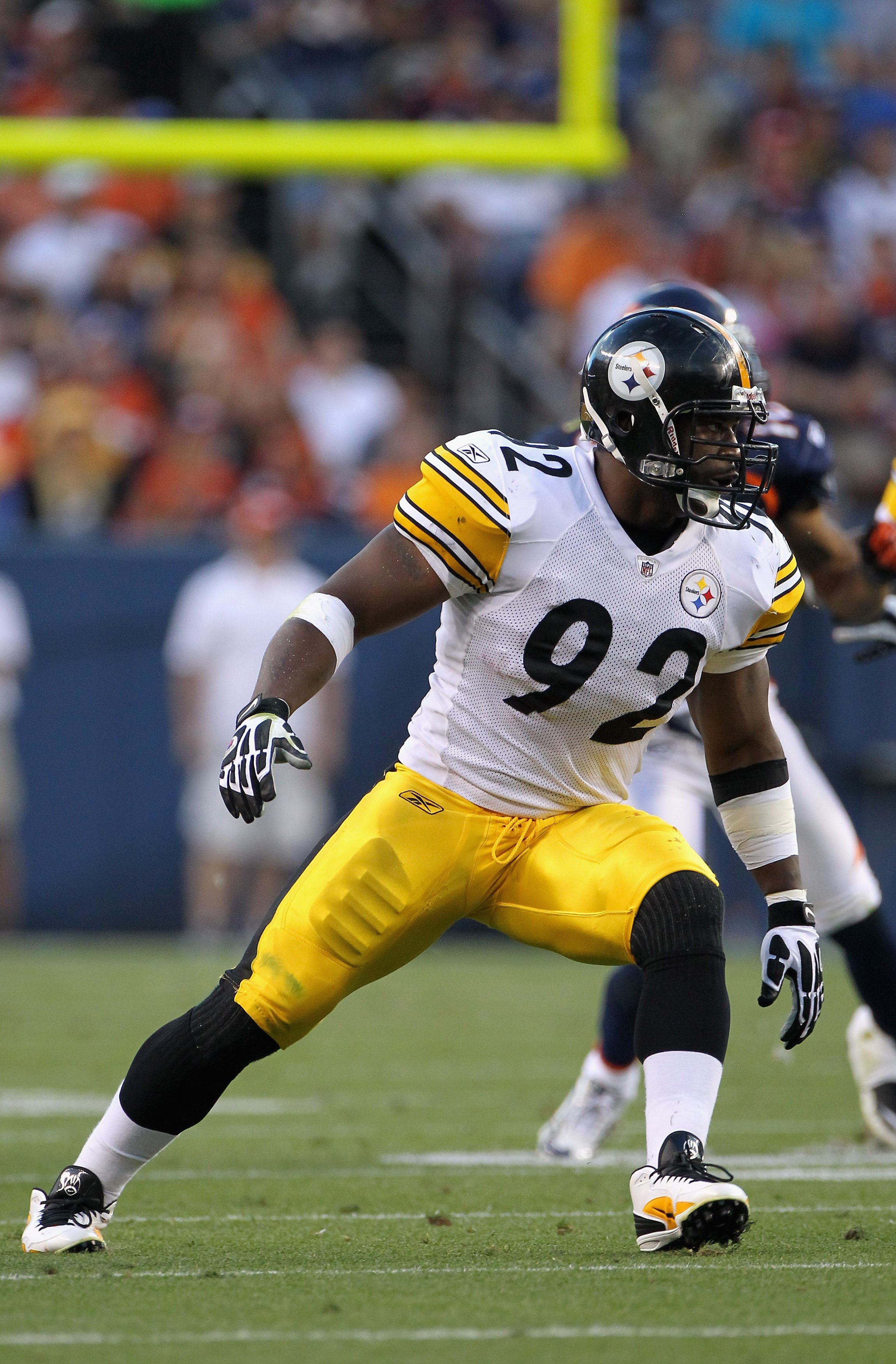 DENVER - AUGUST 29:  Linebacker James Harrison #92 of the Pittsburgh Steelers defends against the Denver Broncos during preseason NFL action at INVESCO Field at Mile High on August 29, 2010 in Denver, Colorado. The Broncos defeated the Steelers 34-17.  (P