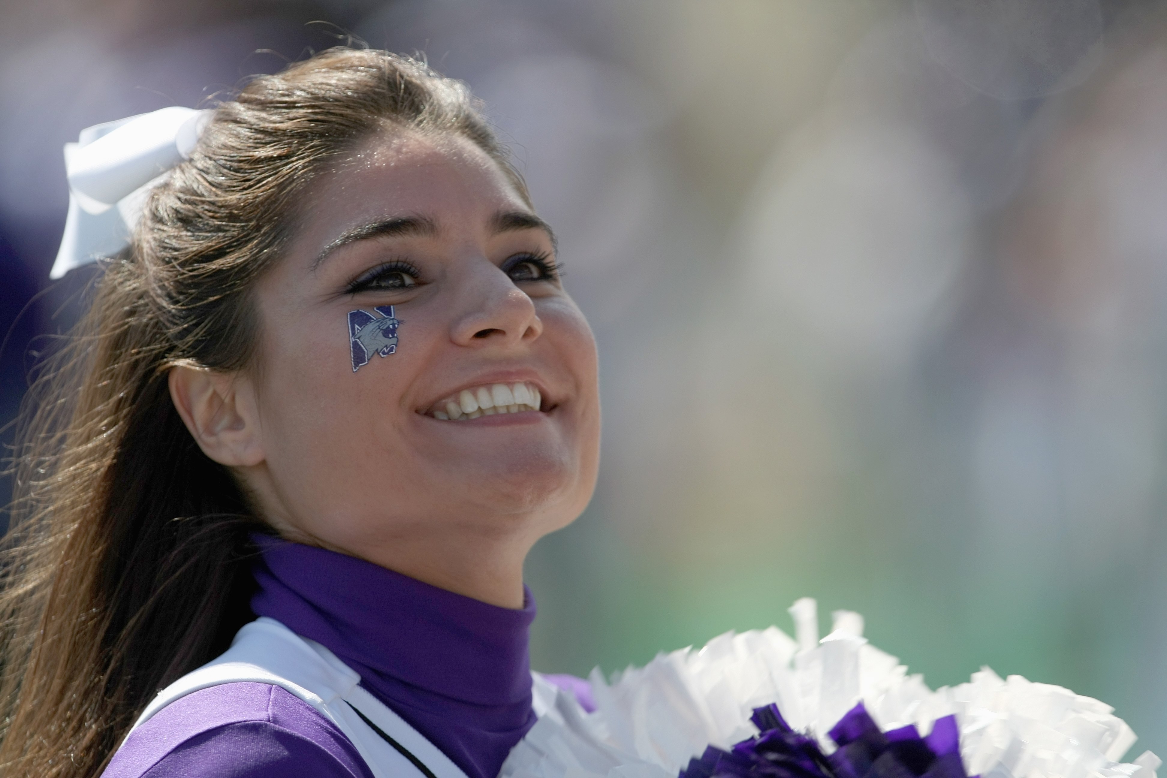 EVANSTON, IL - SEPTEMBER 8:  A cheerleader of the Northwestern Wildcats smiles during the game against the Nevada Wolf Pack on September 8, 2007 at Ryan Field at Northwestern University in Evanston, Illinois. (Photo by Jonathan Daniel/Getty Images)