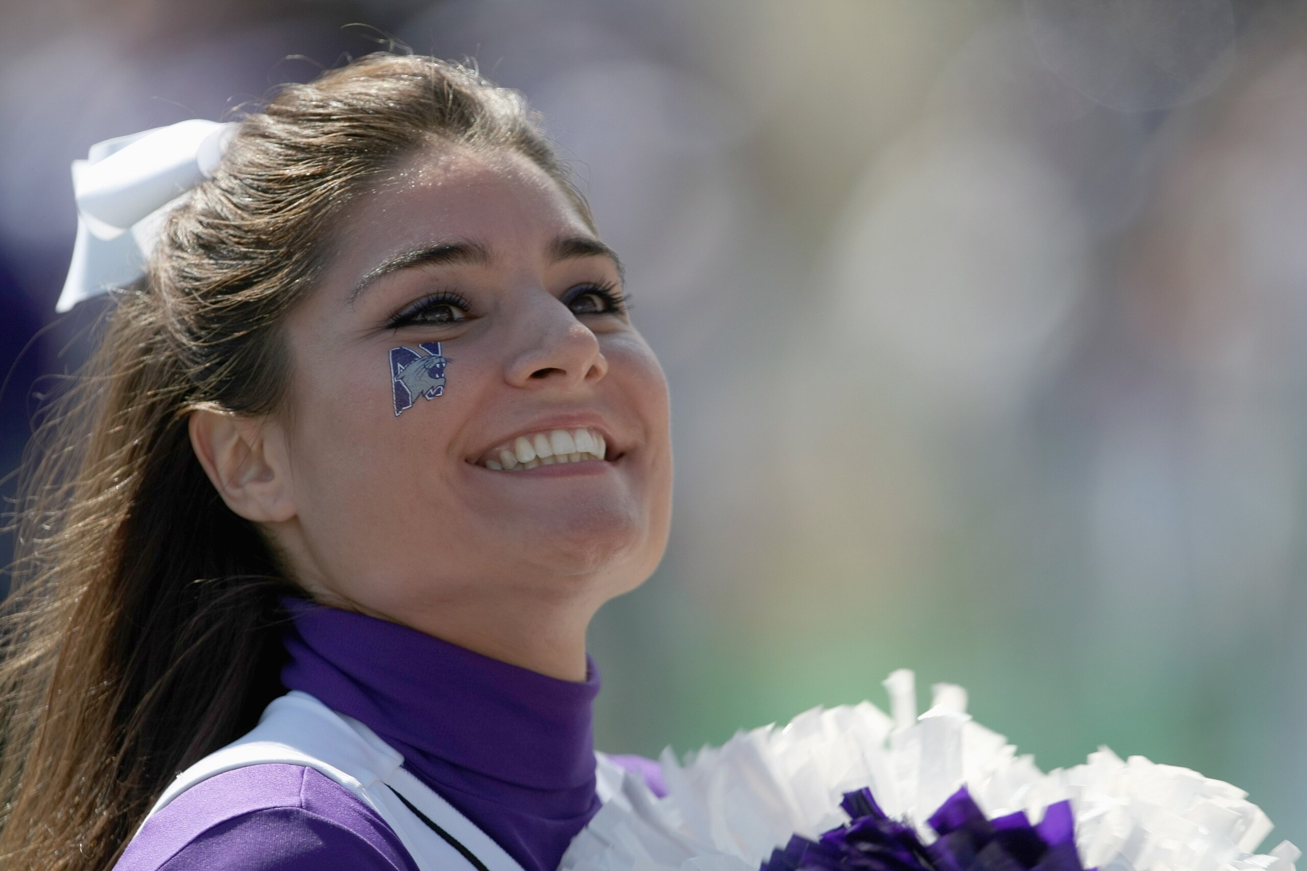 EVANSTON, IL - SEPTEMBER 8:  A cheerleader of the Northwestern Wildcats smiles during the game against the Nevada Wolf Pack on September 8, 2007 at Ryan Field at Northwestern University in Evanston, Illinois. (Photo by Jonathan Daniel/Getty Images)