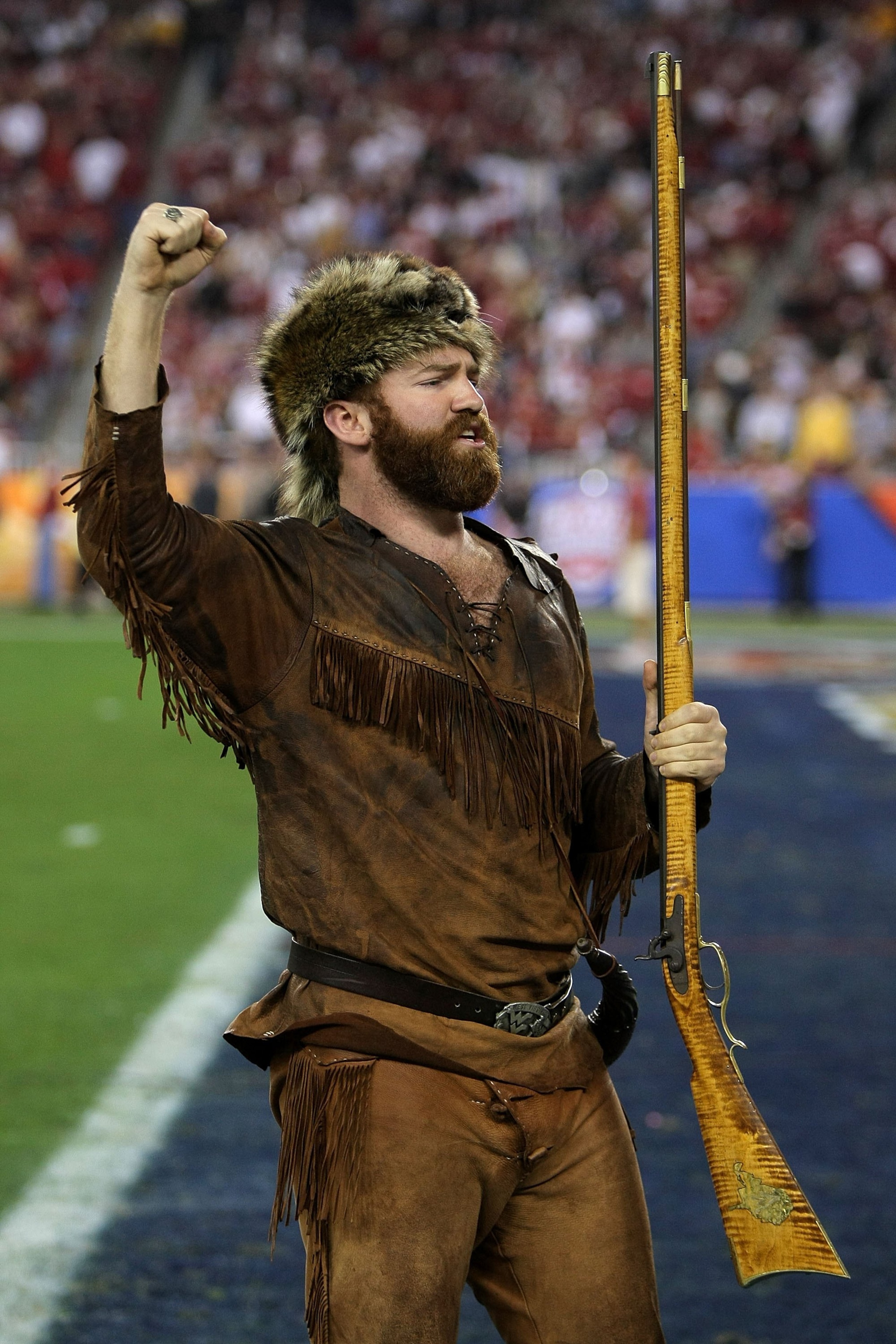 GLENDALE, AZ - JANUARY 02:  The mascot of the West Virginia Mountaineers fires up the crowd before the Mountaineers take on the Oklahoma Sooners at the Tostito's Fiesta Bowl at University of Phoenix Stadium January 2, 2008 in Glendale, Arizona.  (Photo by