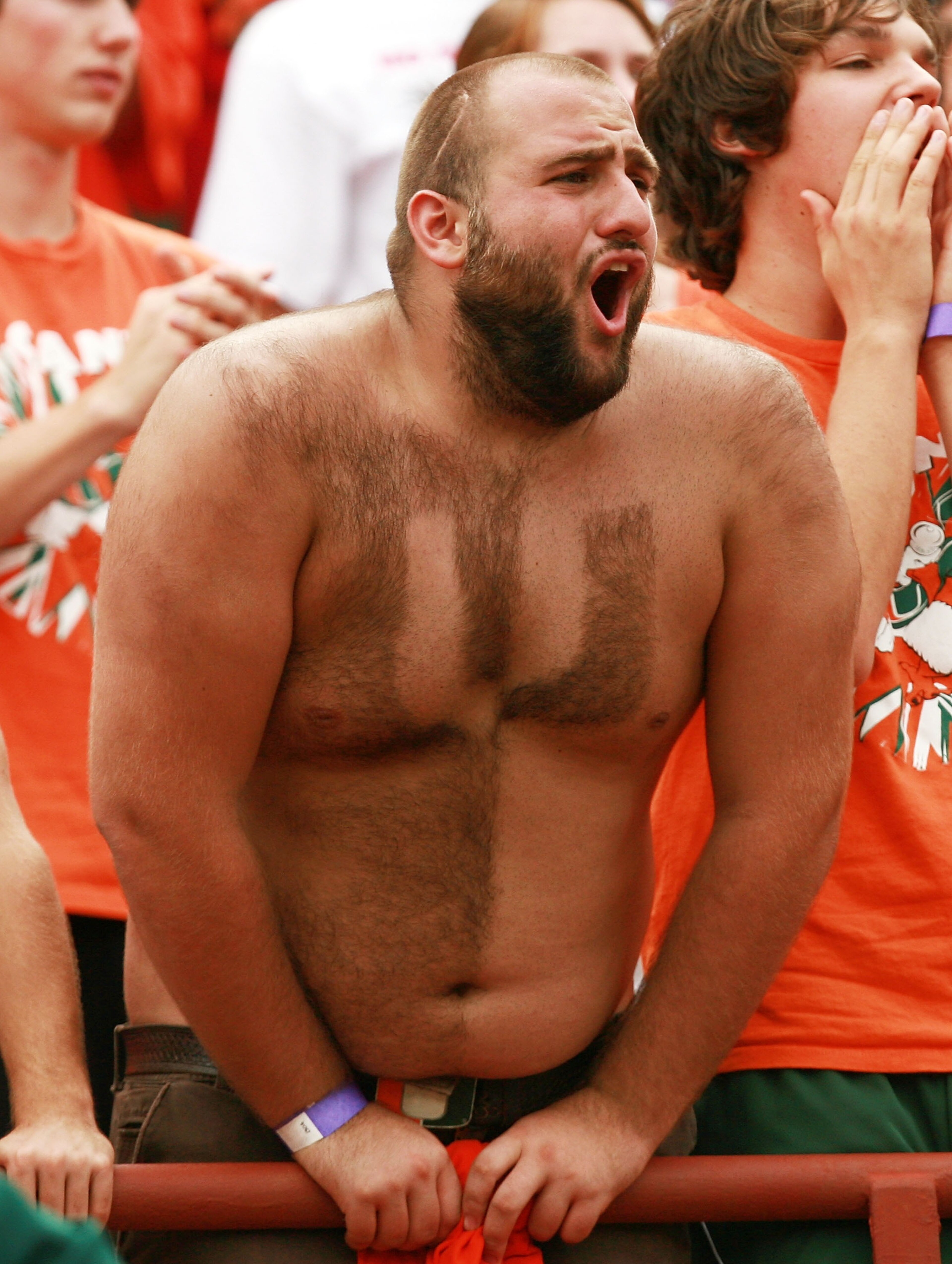 CORAL GABLES, FL - OCTOBER 13:  A Miami fan cheers as the Georgia Tech Yellow Jackets take on the Miami Hurricanes at the Orange Bowl on October 13, 2007 in Coral Gables, Florida. Georgia Tech defeated Miami 17-14.  (Photo by Doug Benc/Getty Images)