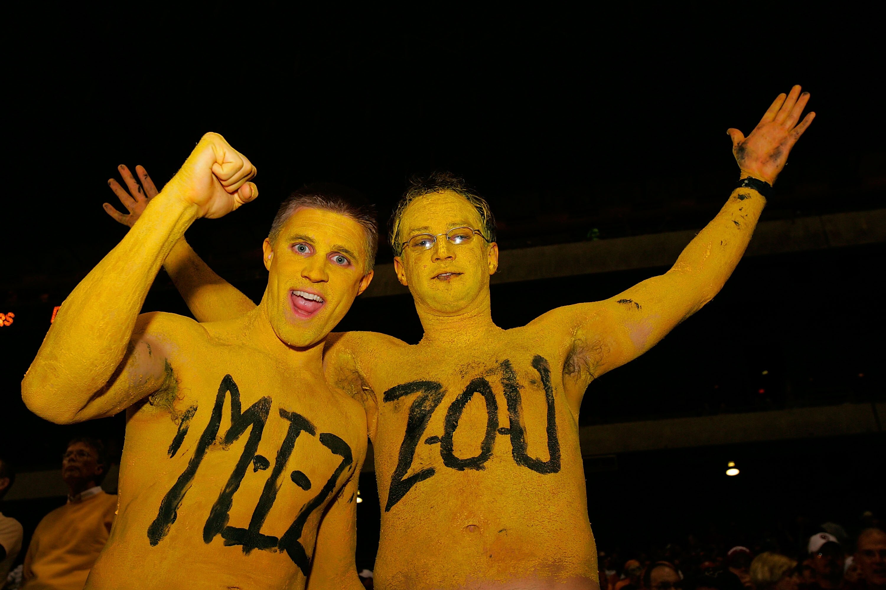 SAN ANTONIO - DECEMBER 1:  Missouri Tigers fans (L-R) Daniel Barr and Tyler Watson cheer before a game with the Oklahoma Sooners during the Big 12 Championship at the Alamodome December 1, 2007 in San Antonio, Texas.  (Photo by Ronald Martinez/Getty Image