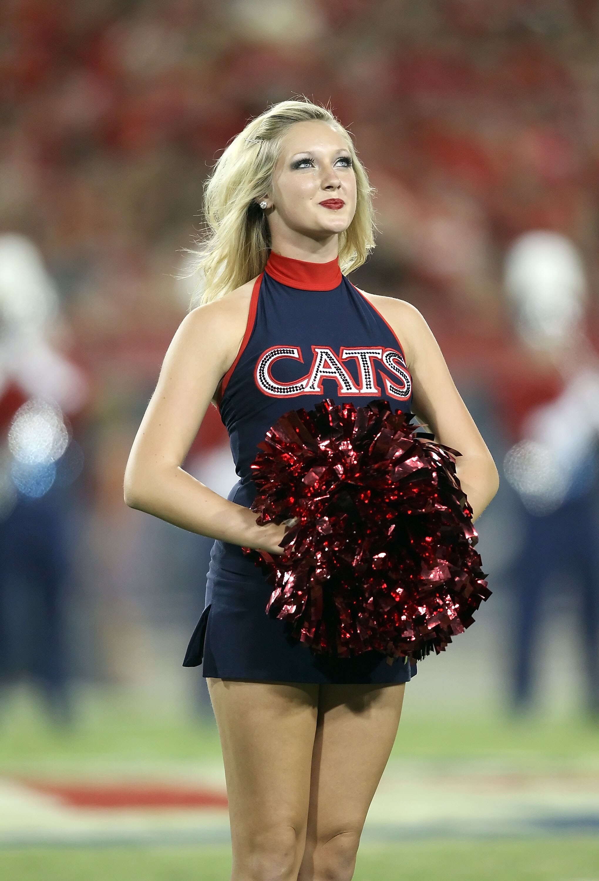 TUCSON, AZ - SEPTEMBER 25:  A Arizona Wildcats cheerleader performs before the college football game against the California Bears at Arizona Stadium on September 25, 2010 in Tucson, Arizona.   The Wildcats defeated the Golden Bears 10-9.  (Photo by Christ