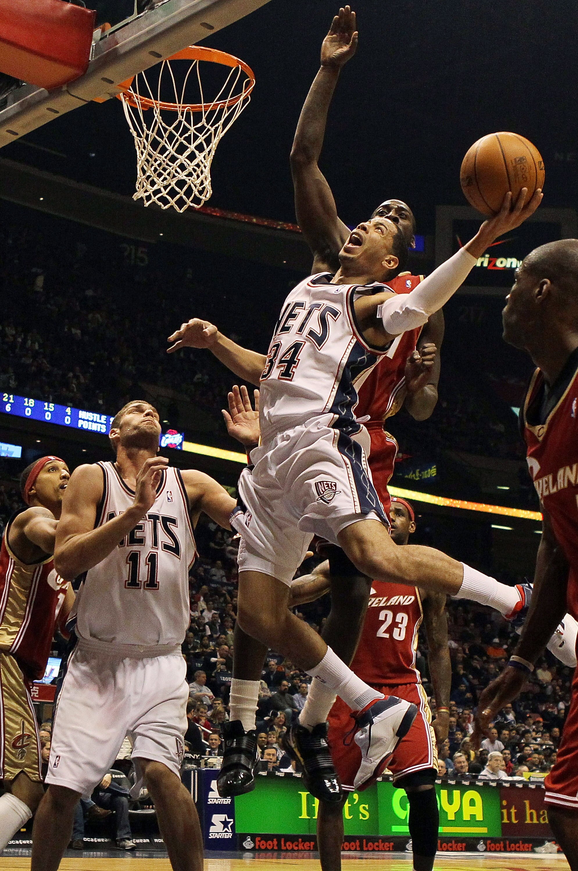 EAST RUTHERFORD, NJ - MARCH 03:  Devin Harris #34 of the New Jersey Nets drives to the hoop against the Cleveland Cavaliers at the Izod Center on March 3, 2010 in East Rutherford, New Jersey.NOTE TO USER: User expressly acknowledges and agrees that, by do