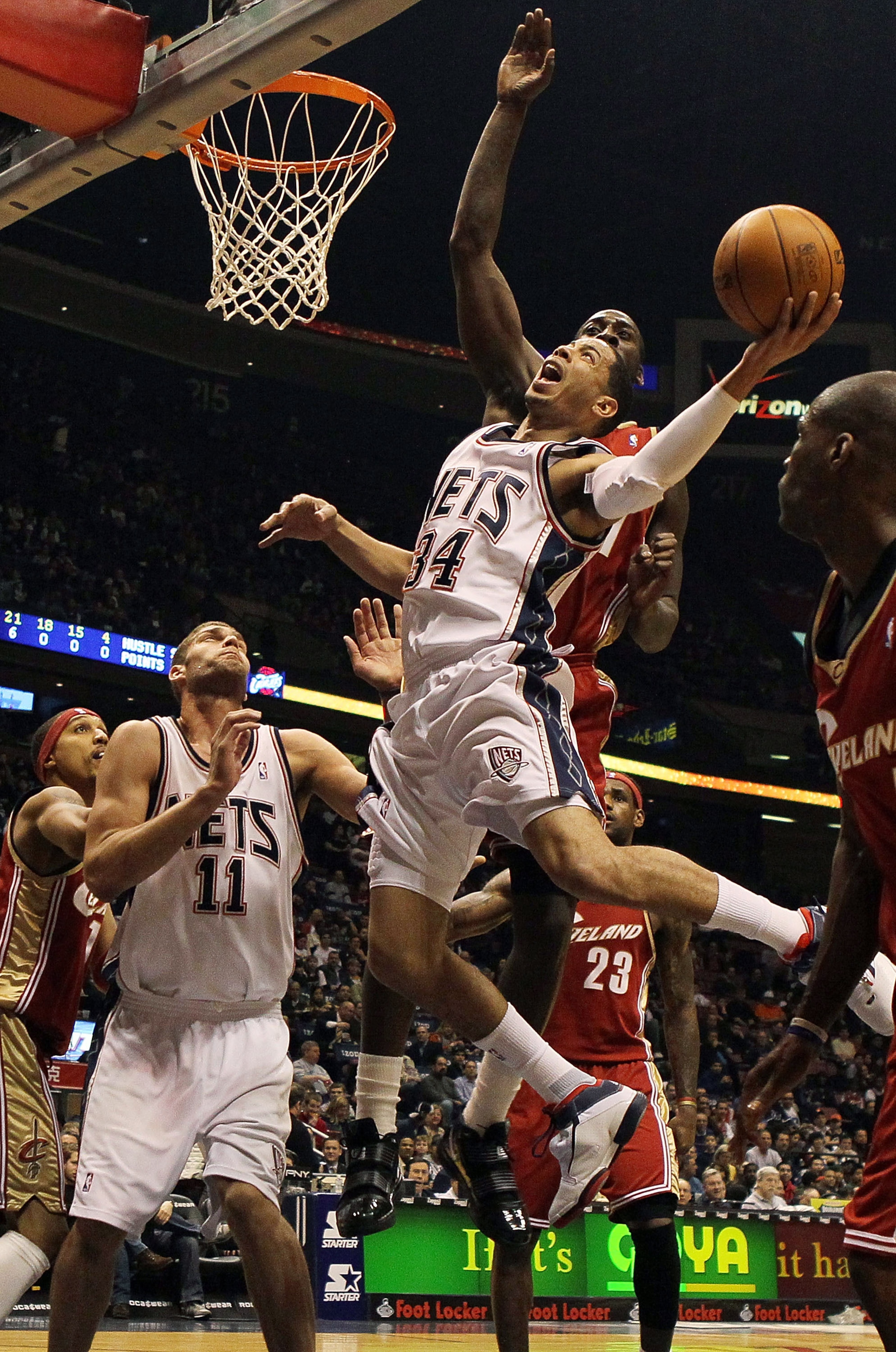 EAST RUTHERFORD, NJ - MARCH 03:  Devin Harris #34 of the New Jersey Nets drives to the hoop against the Cleveland Cavaliers at the Izod Center on March 3, 2010 in East Rutherford, New Jersey.NOTE TO USER: User expressly acknowledges and agrees that, by do
