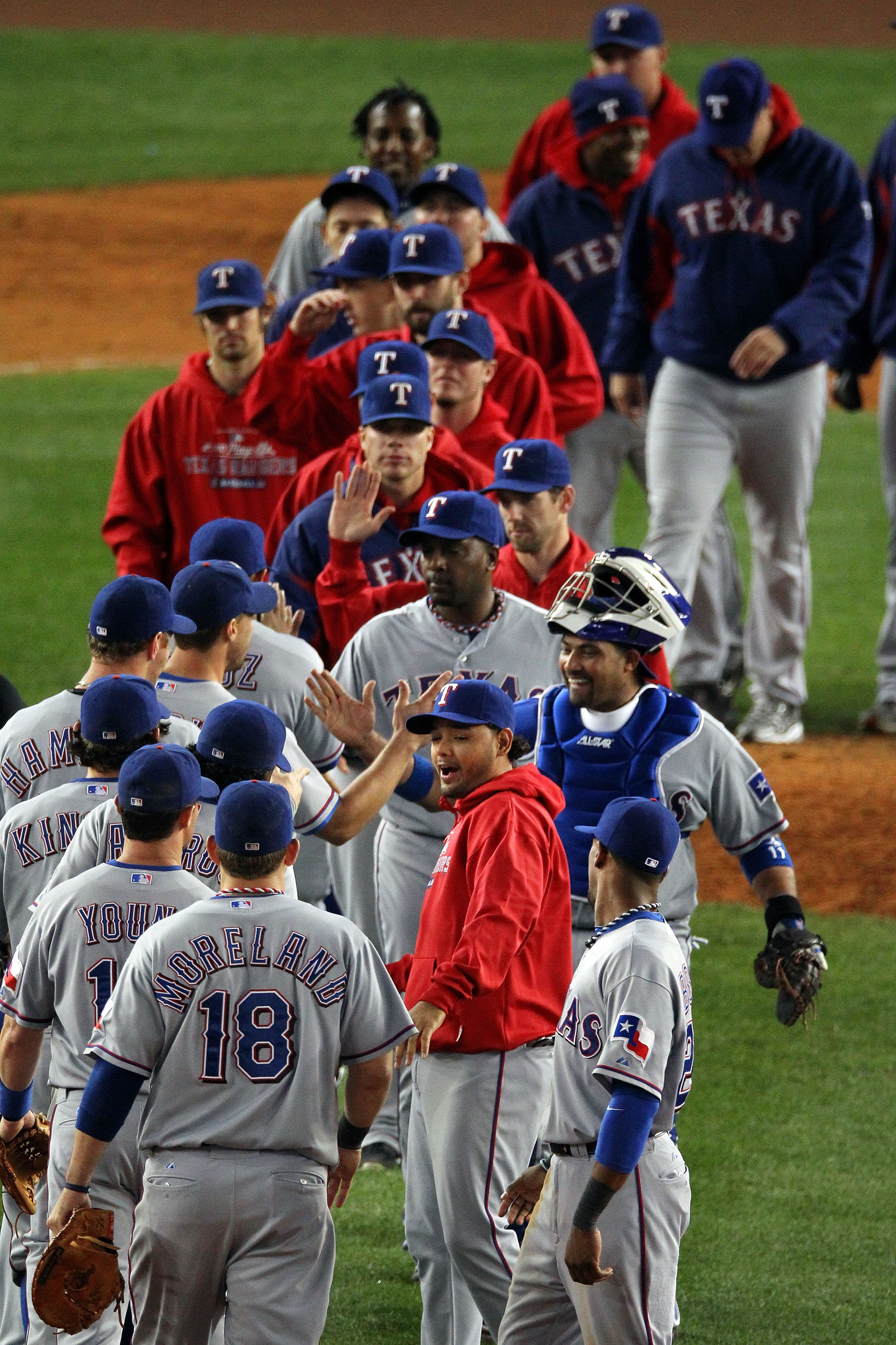 NEW YORK - OCTOBER 19:  The Texas Rangers celebrate after defeating the New York Yankees by a score of 10-3 in Game Four of the ALCS during the 2010 MLB Playoffs at Yankee Stadium on October 19, 2010 in the Bronx borough of New York City.  (Photo by Al Be