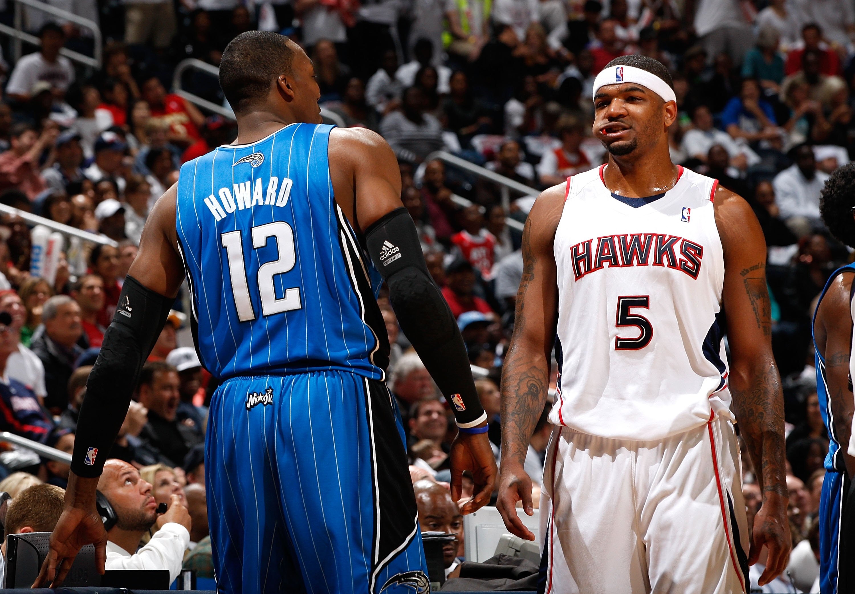 ATLANTA - MAY 10:  Dwight Howard #12 of the Orlando Magic against Josh Smith #5 of the Atlanta Hawks during Game Four of the Eastern Conference Semifinals of the 2010 NBA Playoffs at Philips Arena on May 10, 2010 in Atlanta, Georgia.  NOTE TO USER: User e
