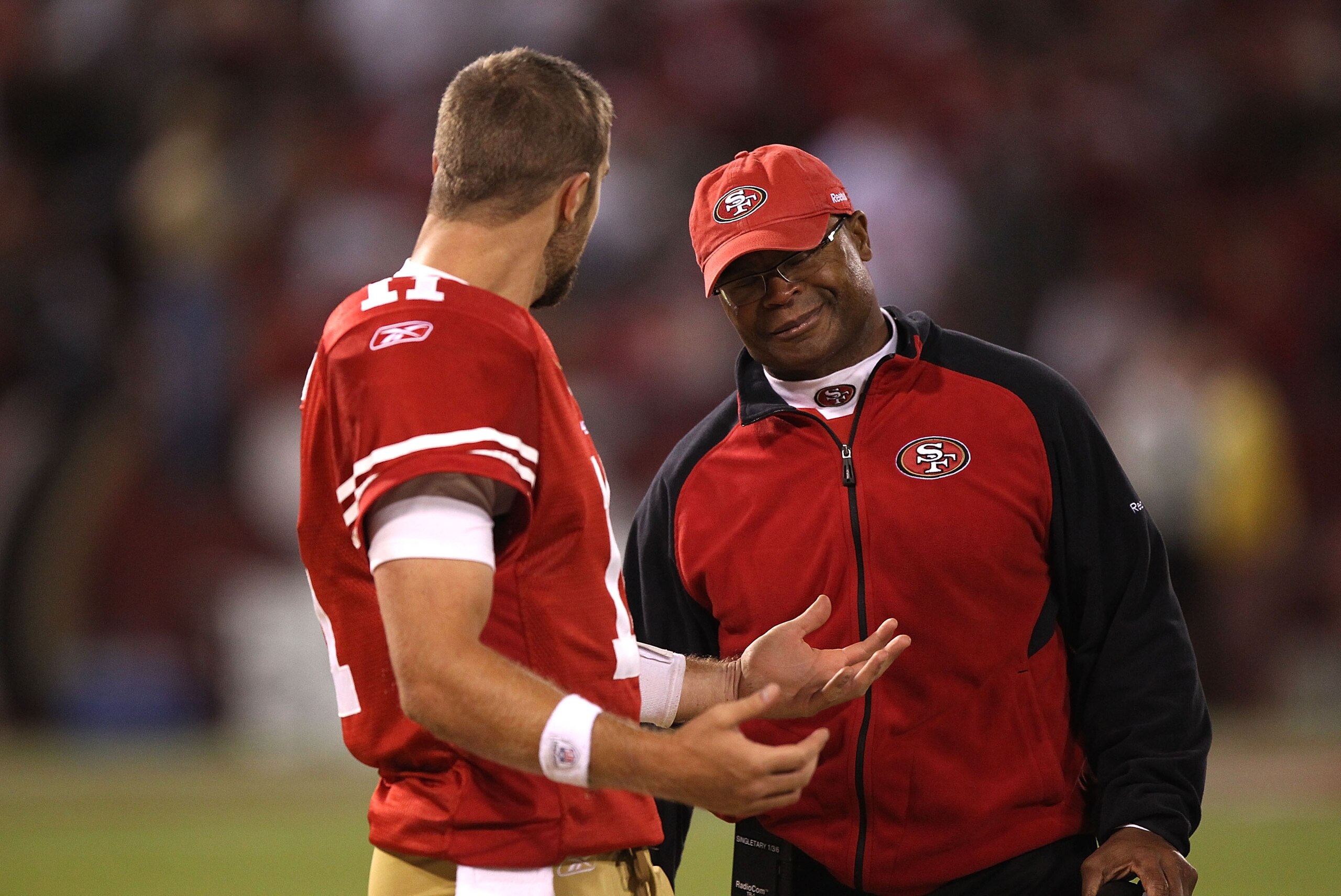 SAN FRANCISCO - OCTOBER 10: Head coach Mike Singletary of the San Francisco 49ers talks with quarterback Alex Smith #11 against the Philadelphia Eagles during an NFL game at Candlestick Park on October 10, 2010 in San Francisco, California. (Photo by Je SAN FRANCISCO - OCTOBER 10: Head coach Mike Singletary of the San Francisco 49ers talks with quarterback Alex Smith #11 against the Philadelphia Eagles during an NFL game at Candlestick Park on October 10, 2010 in San Francisco, California. (Photo by Je