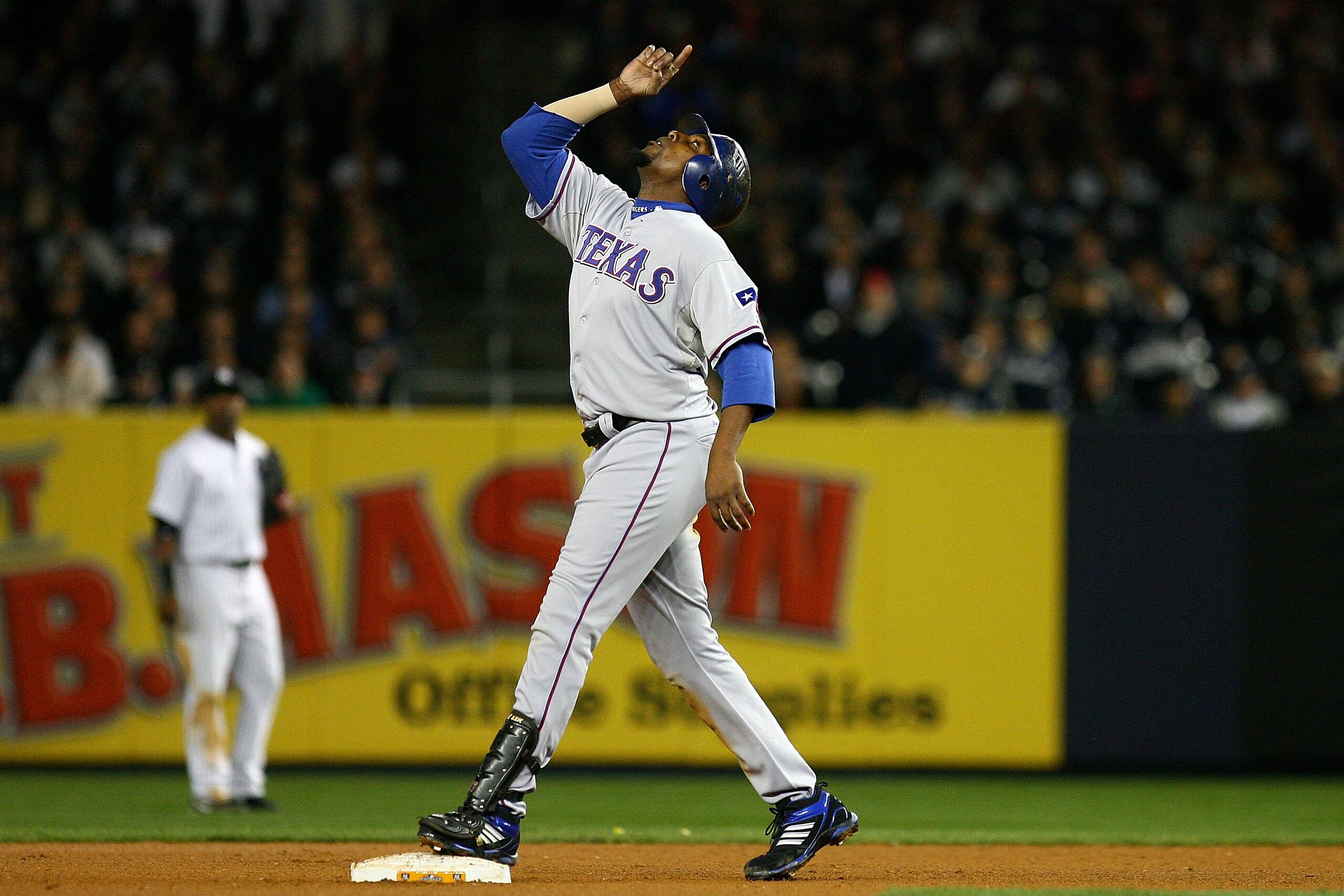 NEW YORK - OCTOBER 19:  Vladimir Guerrero #27 of the Texas Rangers reacts after hitting a double against the New York Yankees in Game Four of the ALCS during the 2010 MLB Playoffs at Yankee Stadium on October 19, 2010 in the Bronx borough of New York City