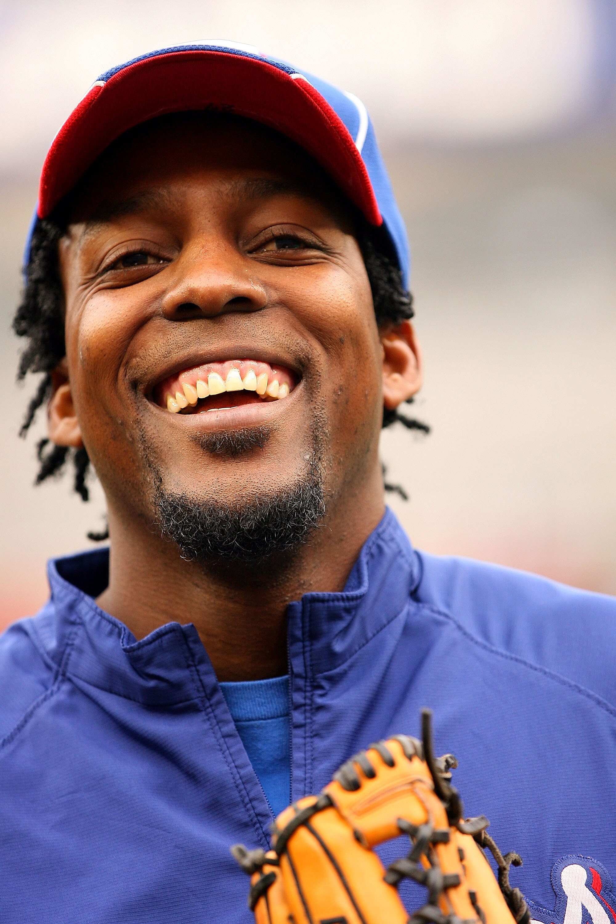 NEW YORK - OCTOBER 20:  Vladimir Guerrero #27 of the Texas Rangers smiles during batting practice against the New York Yankees  in Game Five of the ALCS during the 2010 MLB Playoffs at Yankee Stadium on October 20, 2010 in the Bronx borough of New York Ci