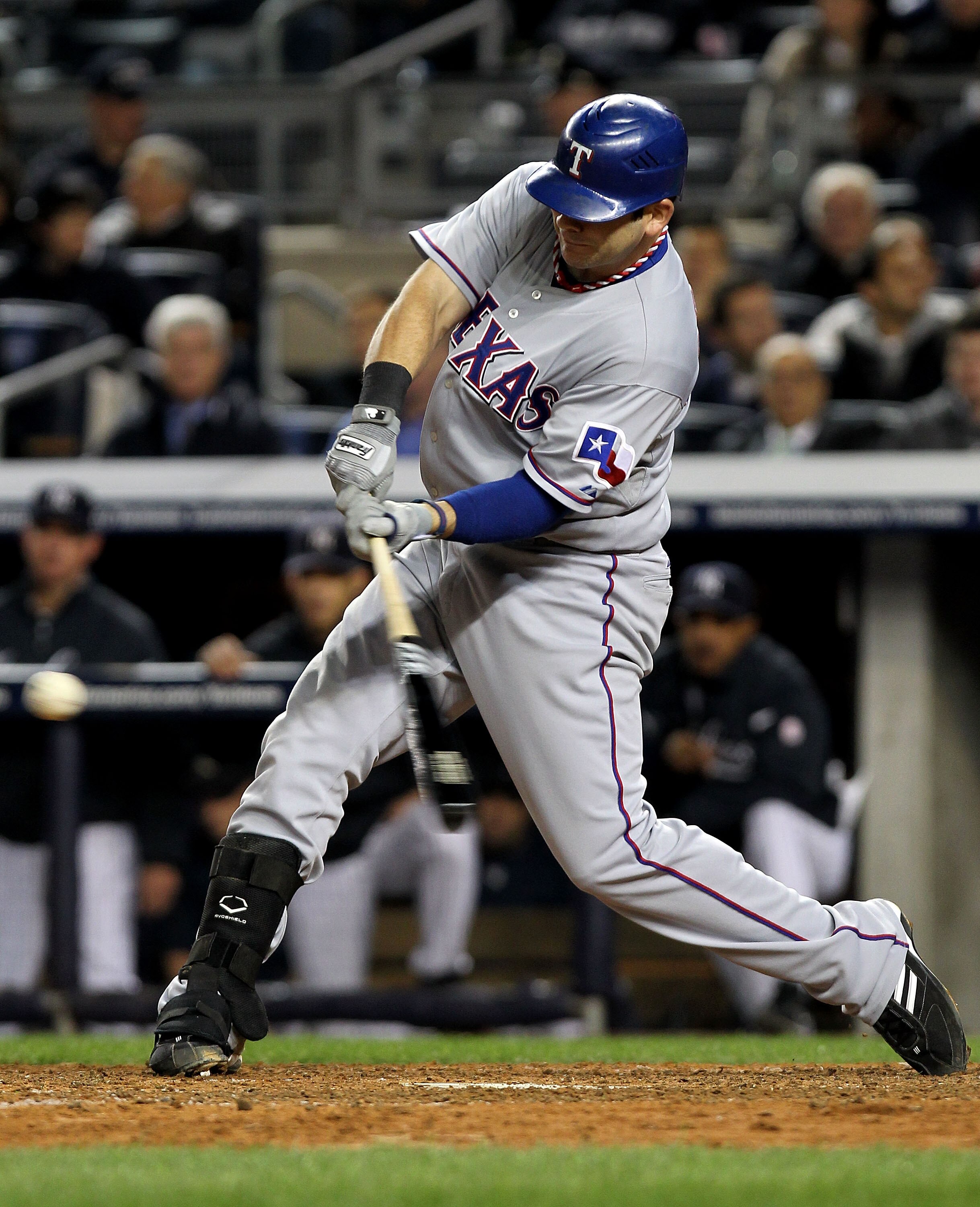 NEW YORK - OCTOBER 18:  Mitch Moreland #18 of the Texas Rangers hits a 2-run single in the top of the ninth inning against the New York Yankees  in Game Three of the ALCS during the 2010 MLB Playoffs at Yankee Stadium on October 18, 2010 in New York, New