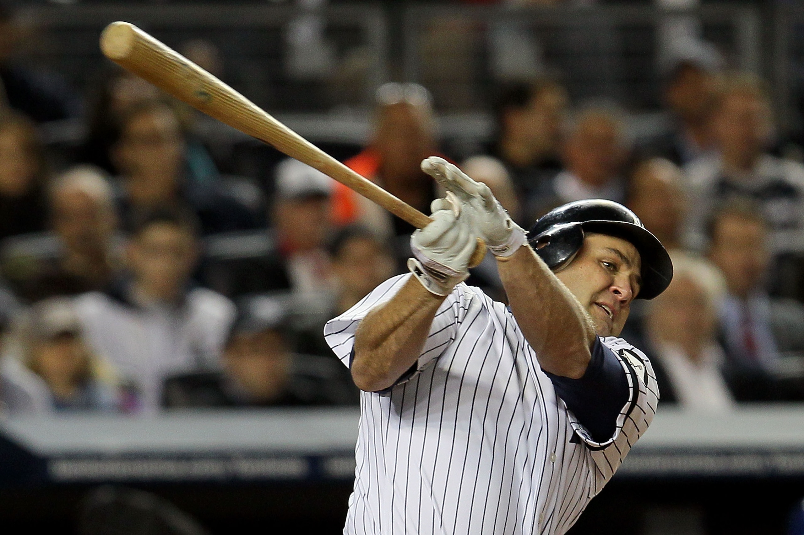 NEW YORK - OCTOBER 19:  Lance Berkman #17 of the New York Yankees hits a single in the bottom of the fourth inning against the Texas Rangers in Game Four of the ALCS during the 2010 MLB Playoffs at Yankee Stadium on October 19, 2010 in the Bronx borough o
