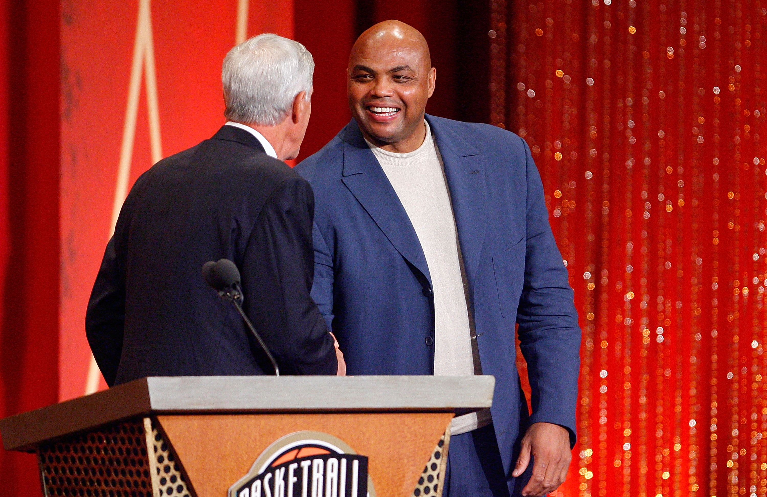 SPRINGFIELD, MA - SEPTEMBER 11:  Charles Barkley presents Coach Jerry Sloan to the Naismith Memorial Basketball Hall of Fame during an induction ceremony on September 11, 2009 in Springfield, Massachusetts. NOTE TO USER: User expressly acknowledges and ag