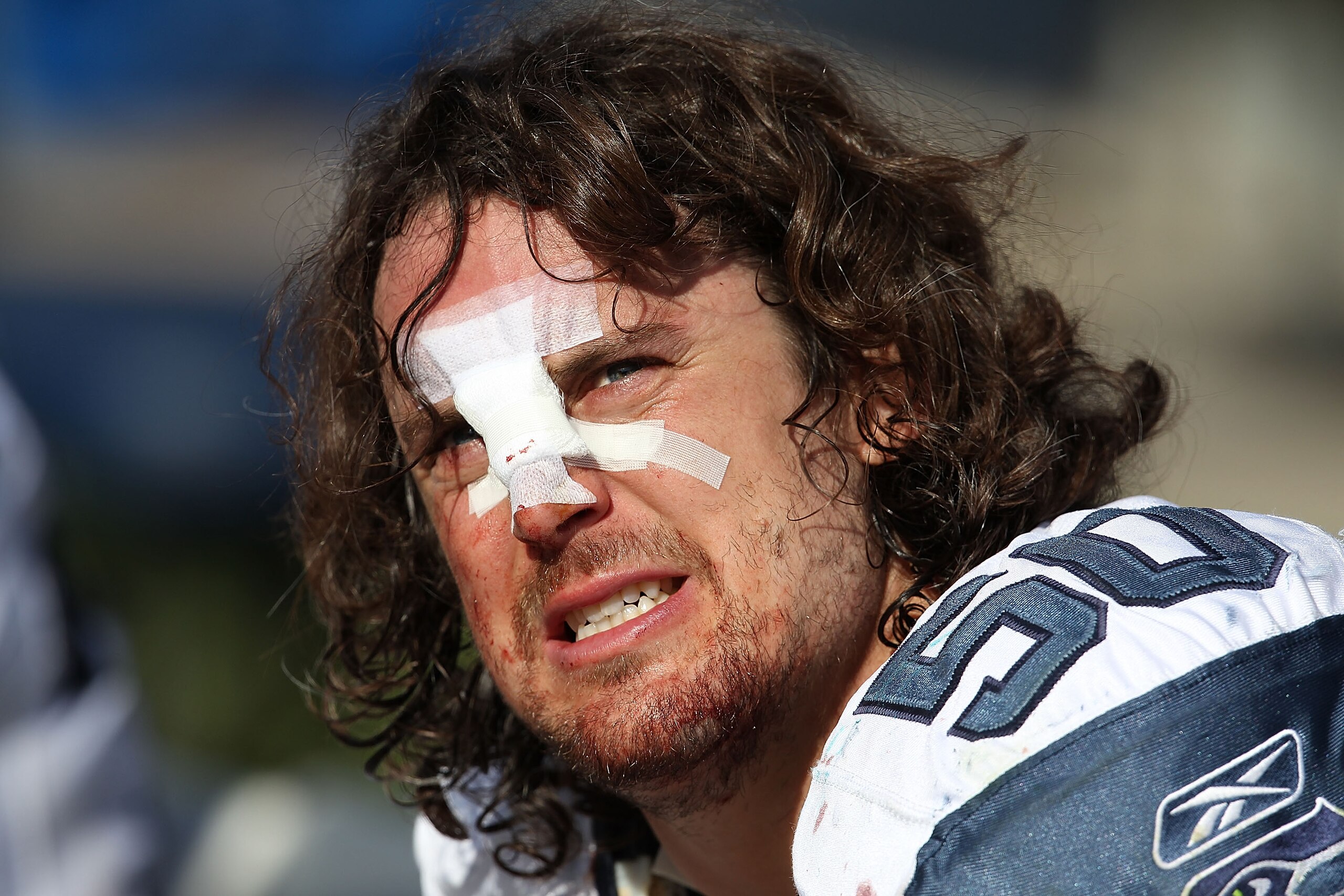 CHICAGO - OCTOBER 17: Ben Hamilton #50 of the Seattle Seahawks sits on the bench after breaking his nose against the Chicago Bears at Soldier Field on October 17, 2010 in Chicago, Illinois. The Seahawks defeated the Bears 23-20. (Photo by Jonathan Daniel/ CHICAGO - OCTOBER 17: Ben Hamilton #50 of the Seattle Seahawks sits on the bench after breaking his nose against the Chicago Bears at Soldier Field on October 17, 2010 in Chicago, Illinois. The Seahawks defeated the Bears 23-20. (Photo by Jonathan Daniel/