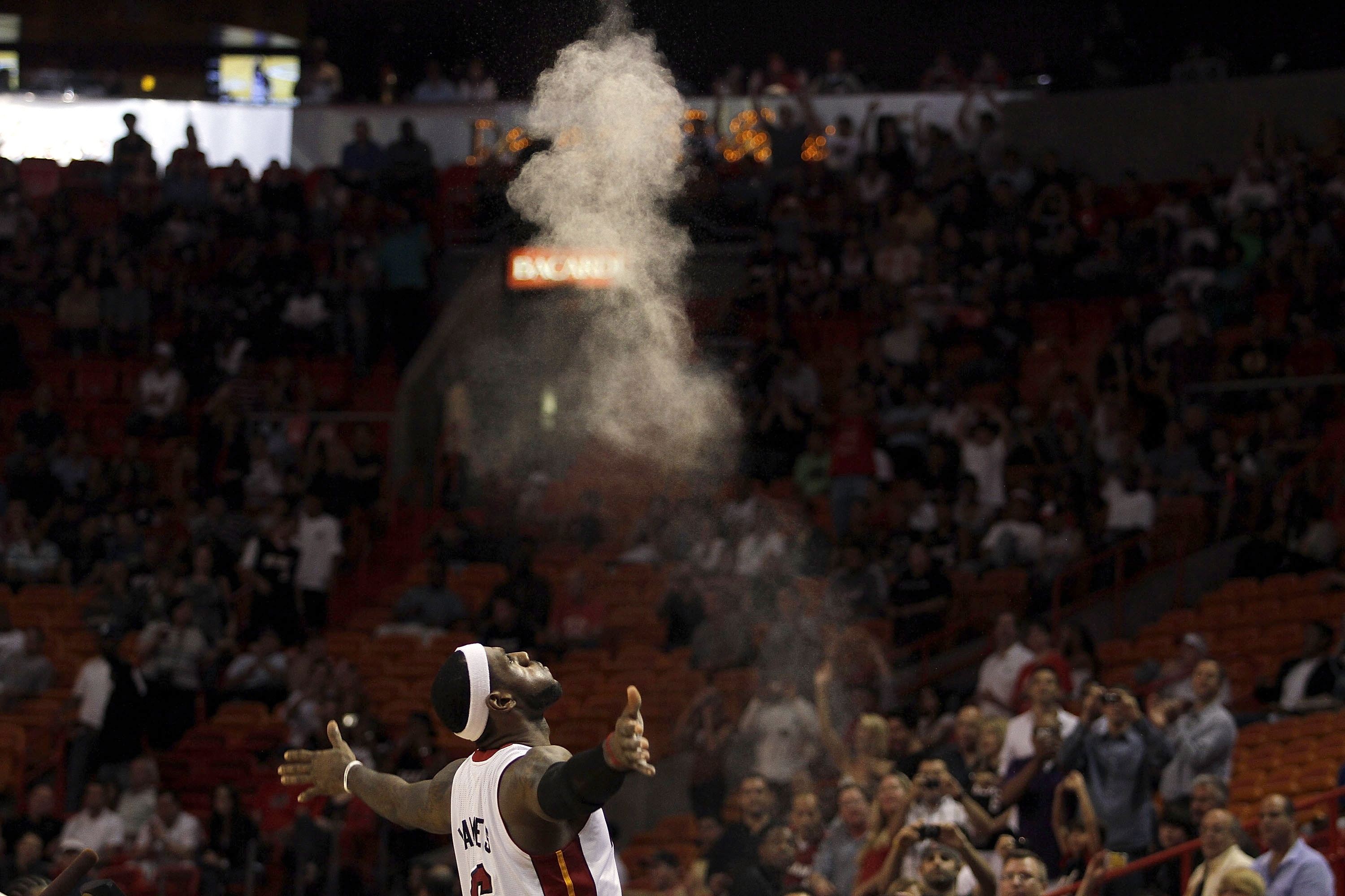 MIAMI - OCTOBER 18:  Forward LeBron James #6 of the Miami Heat prepares to face the Charlotte Bobcats on October 18, 2010 at American Airlines Arena in Miami, Florida. NOTE TO USER: User expressly acknowledges and agrees that, by downloading and/or using